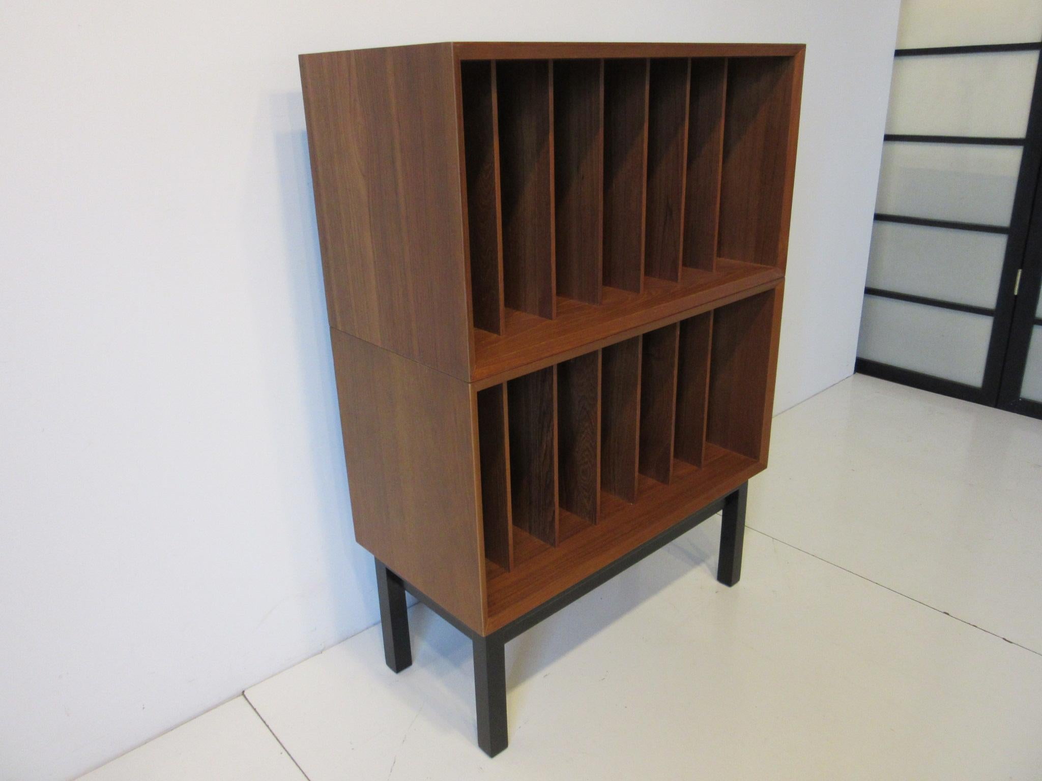 A teak wood Danish record storage cabinet / case with 14 slots at 3.75
