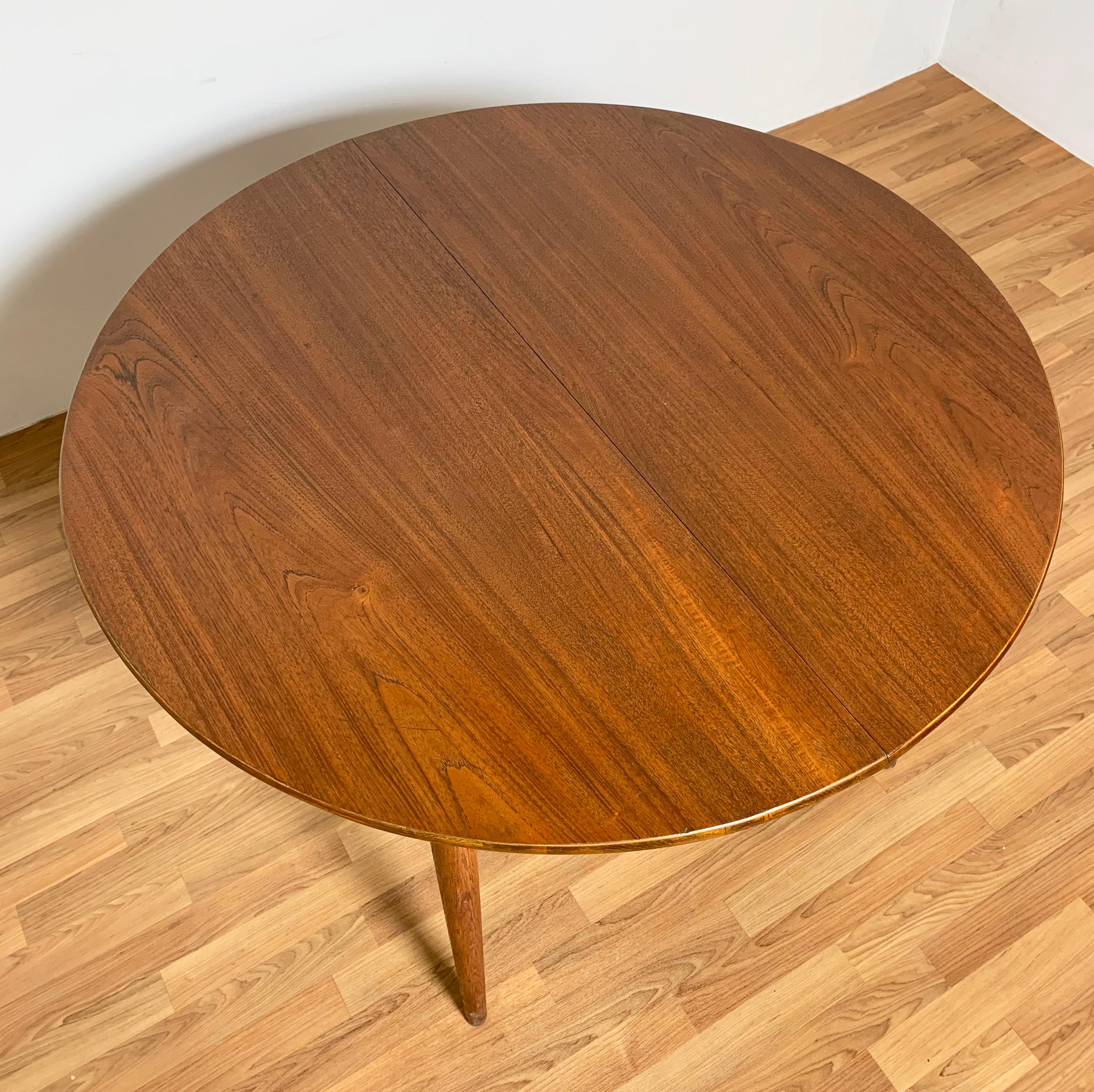 Scandinavian Modern Danish Teak Round Dining Table with Two Leaves, Circa 1950s