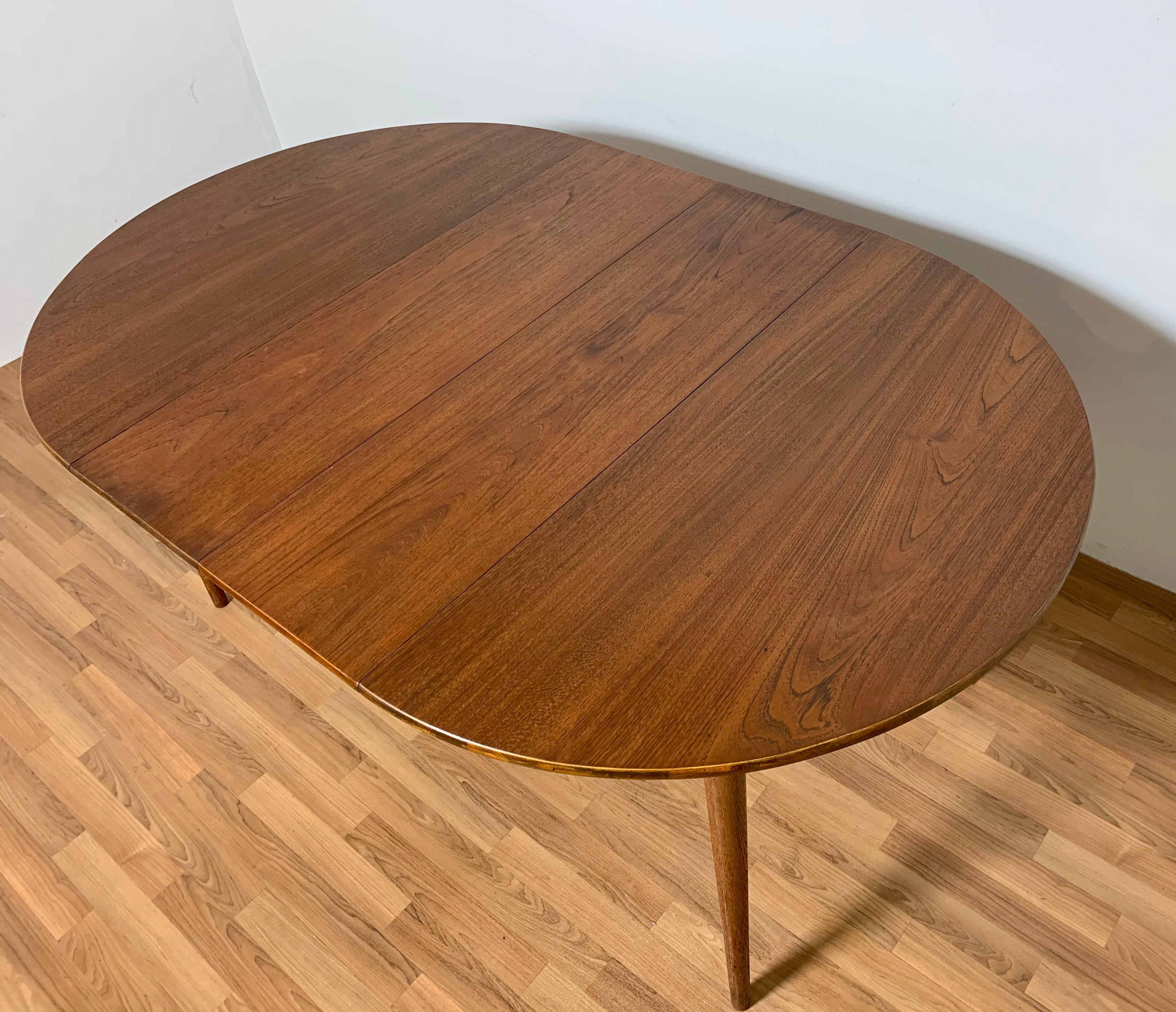 Mid-20th Century Danish Teak Round Dining Table with Two Leaves, Circa 1950s