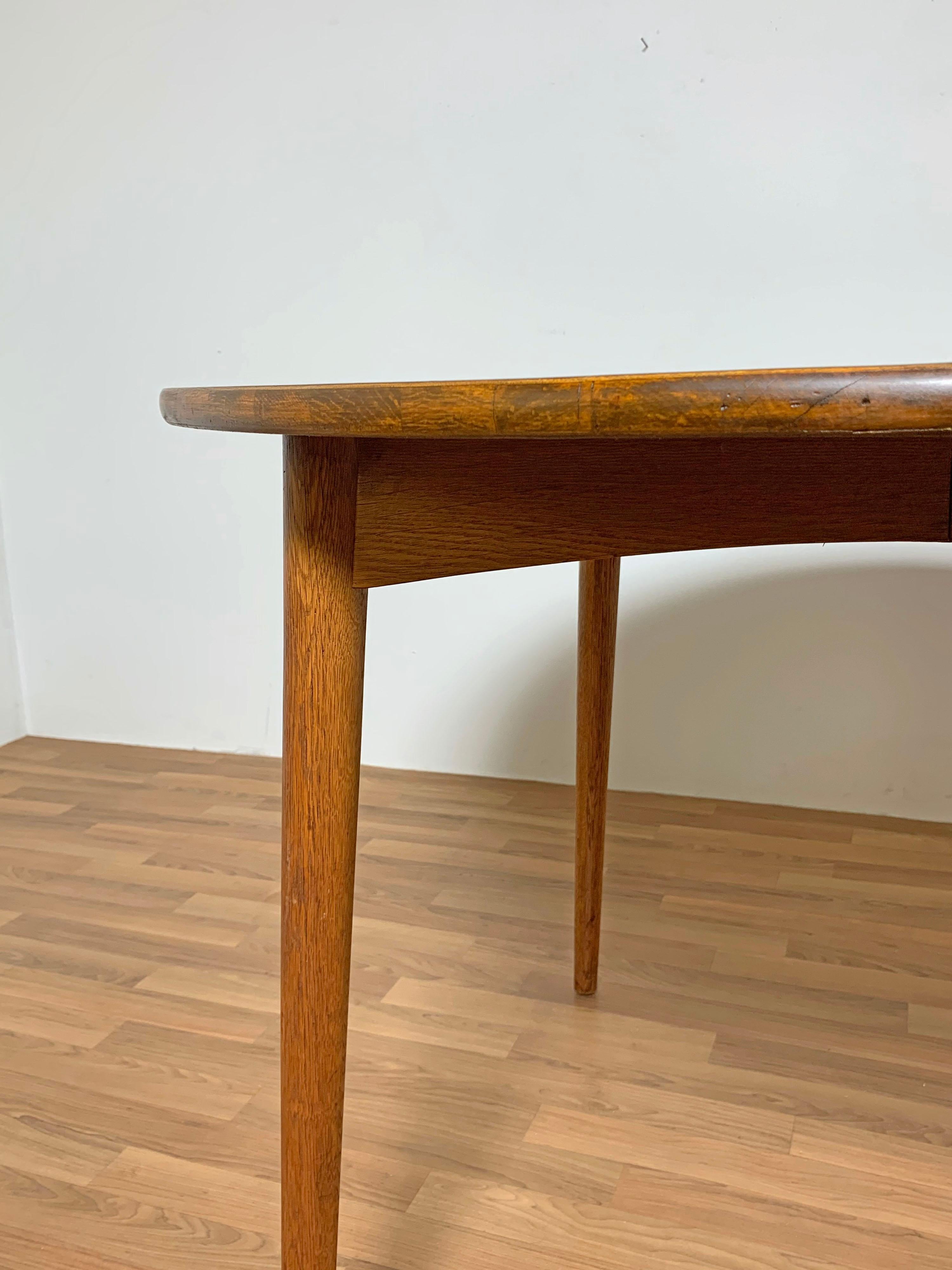 Danish Teak Round Dining Table with Two Leaves, Circa 1950s 2