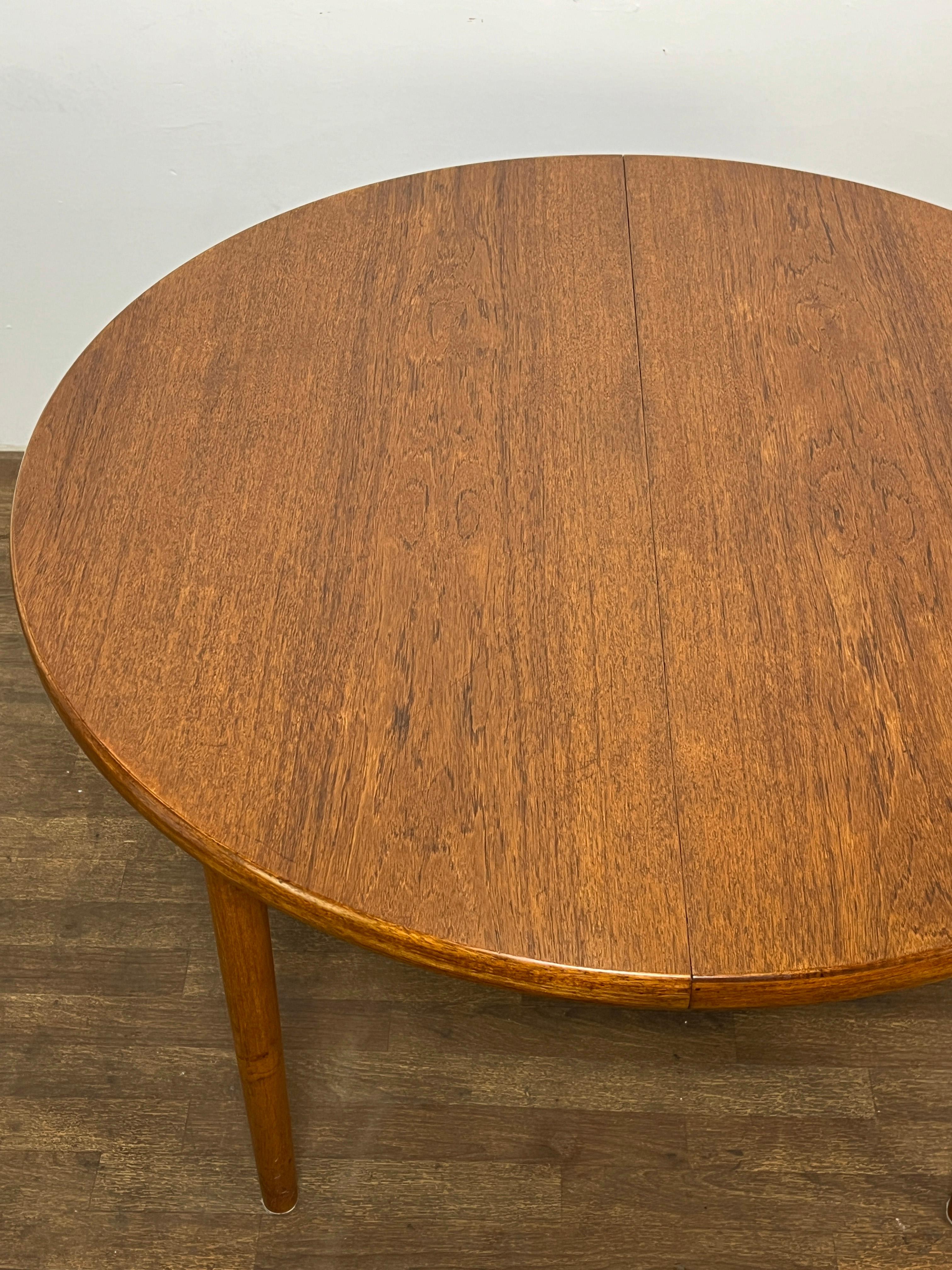 Danish Teak Round Dining Table With Two Leaves, Circa 1960s In Good Condition For Sale In Peabody, MA
