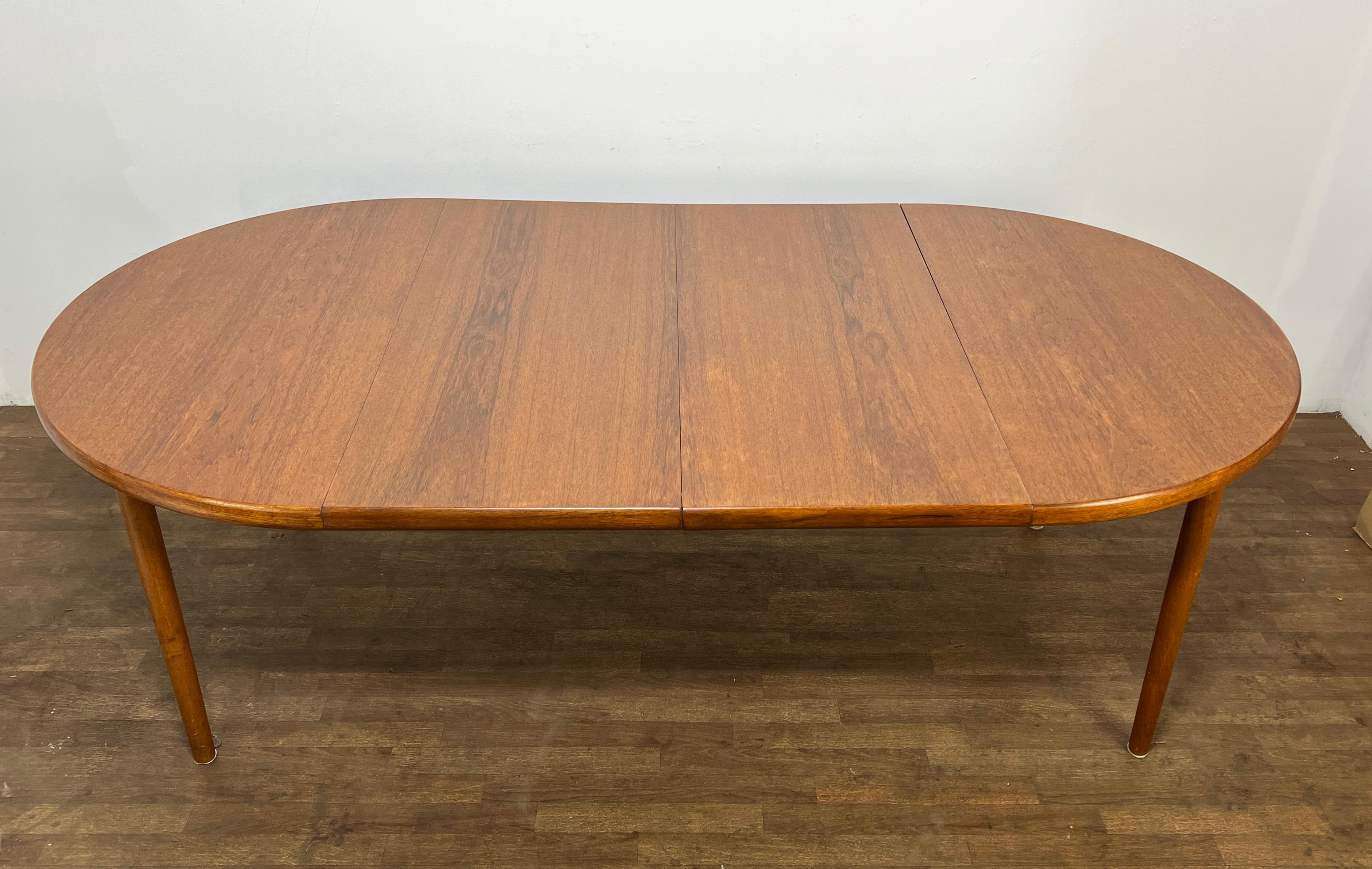 Mid-20th Century Danish Teak Round Dining Table With Two Leaves, Circa 1960s For Sale