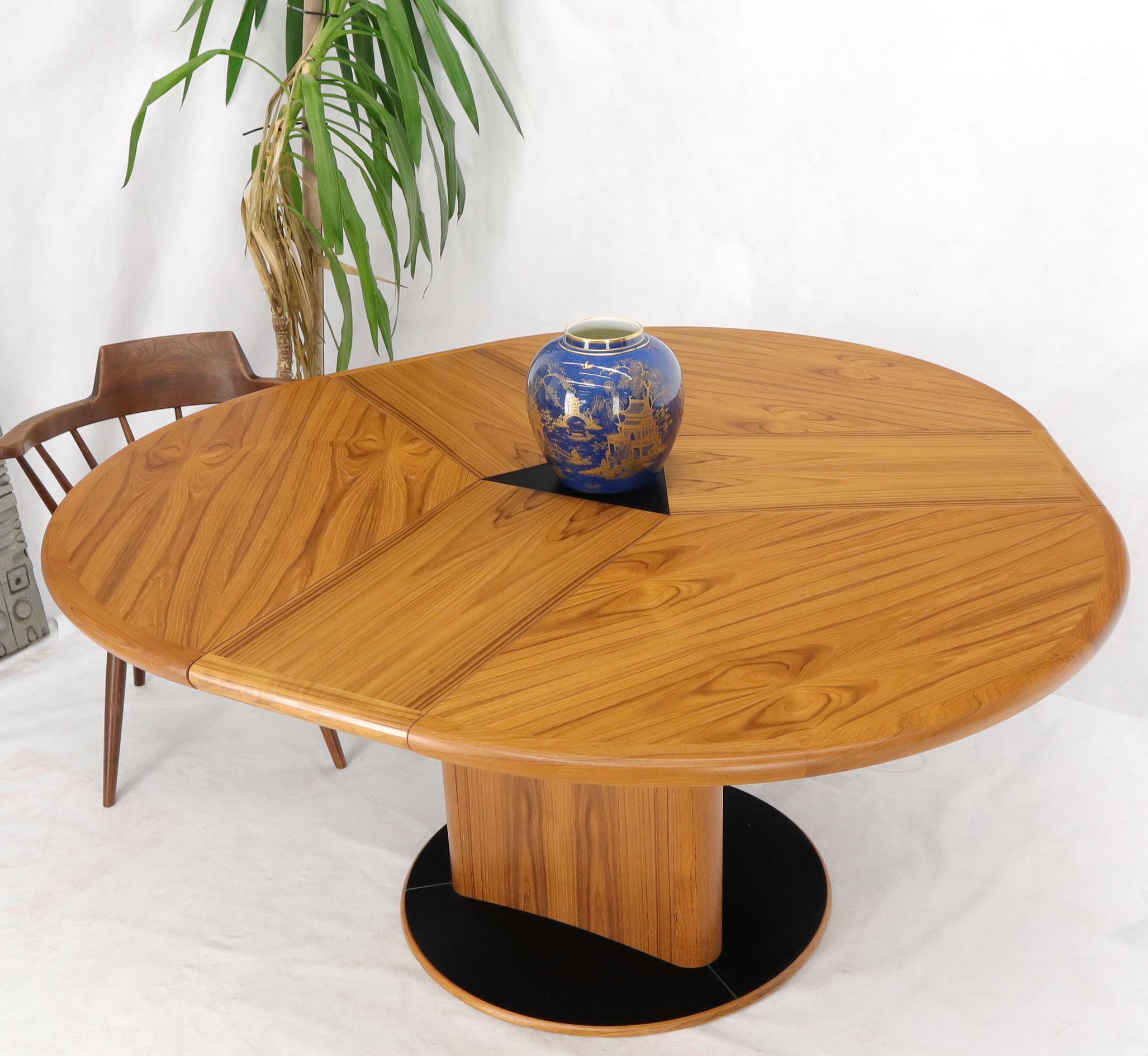 Danish Teak Round Expandable Table with Three Self Storing Leaves 3