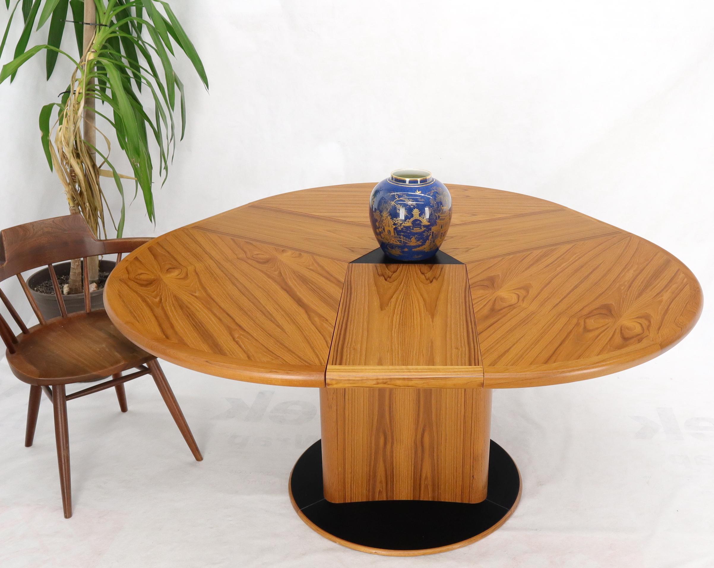 Danish Teak Round Expandable Table with Three Self Storing Leaves 4