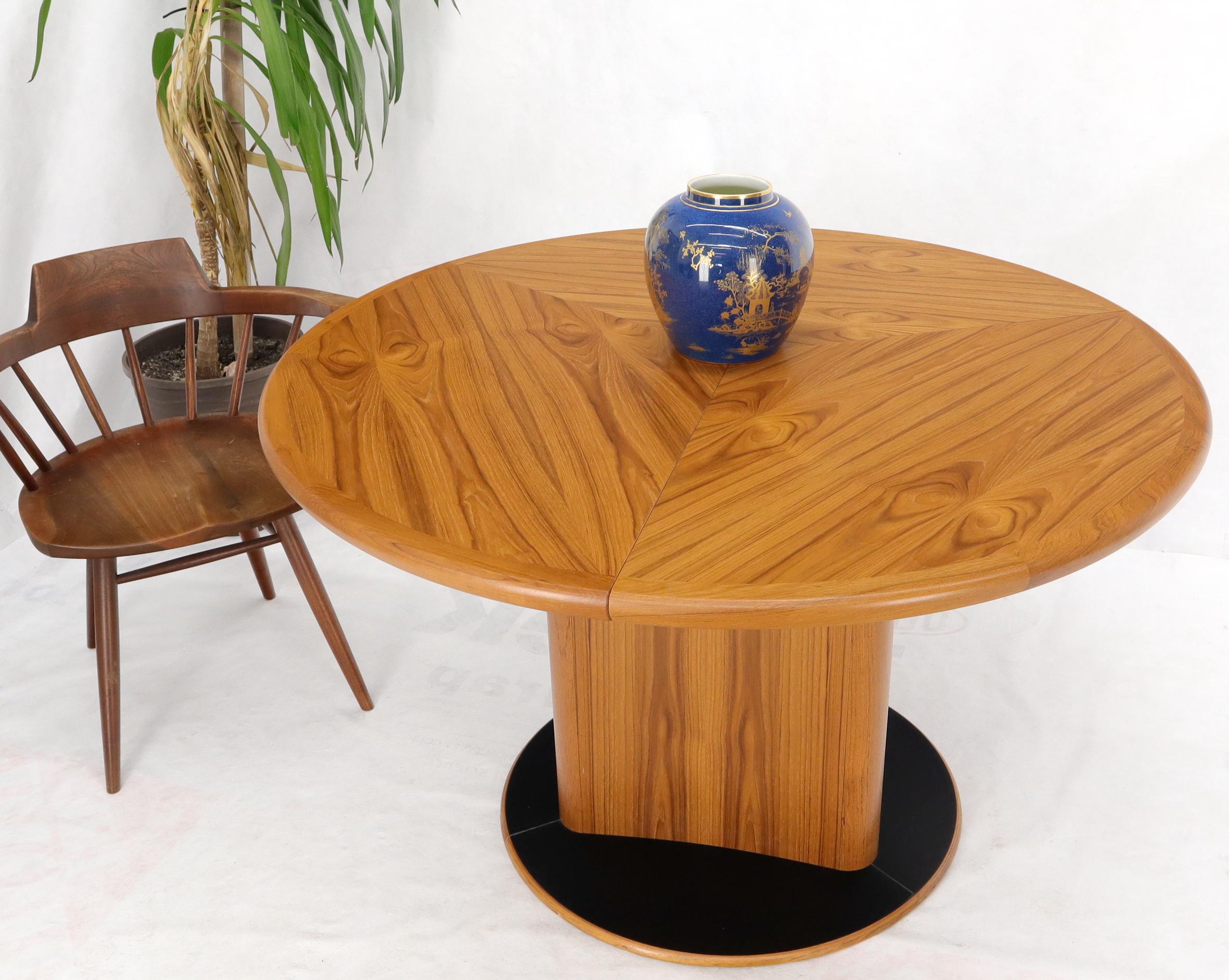 Danish Teak Round Expandable Table with Three Self Storing Leaves 5