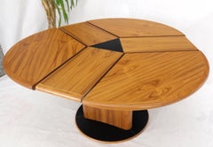 Danish Teak Round Expandable Table with Three Self Storing Leaves