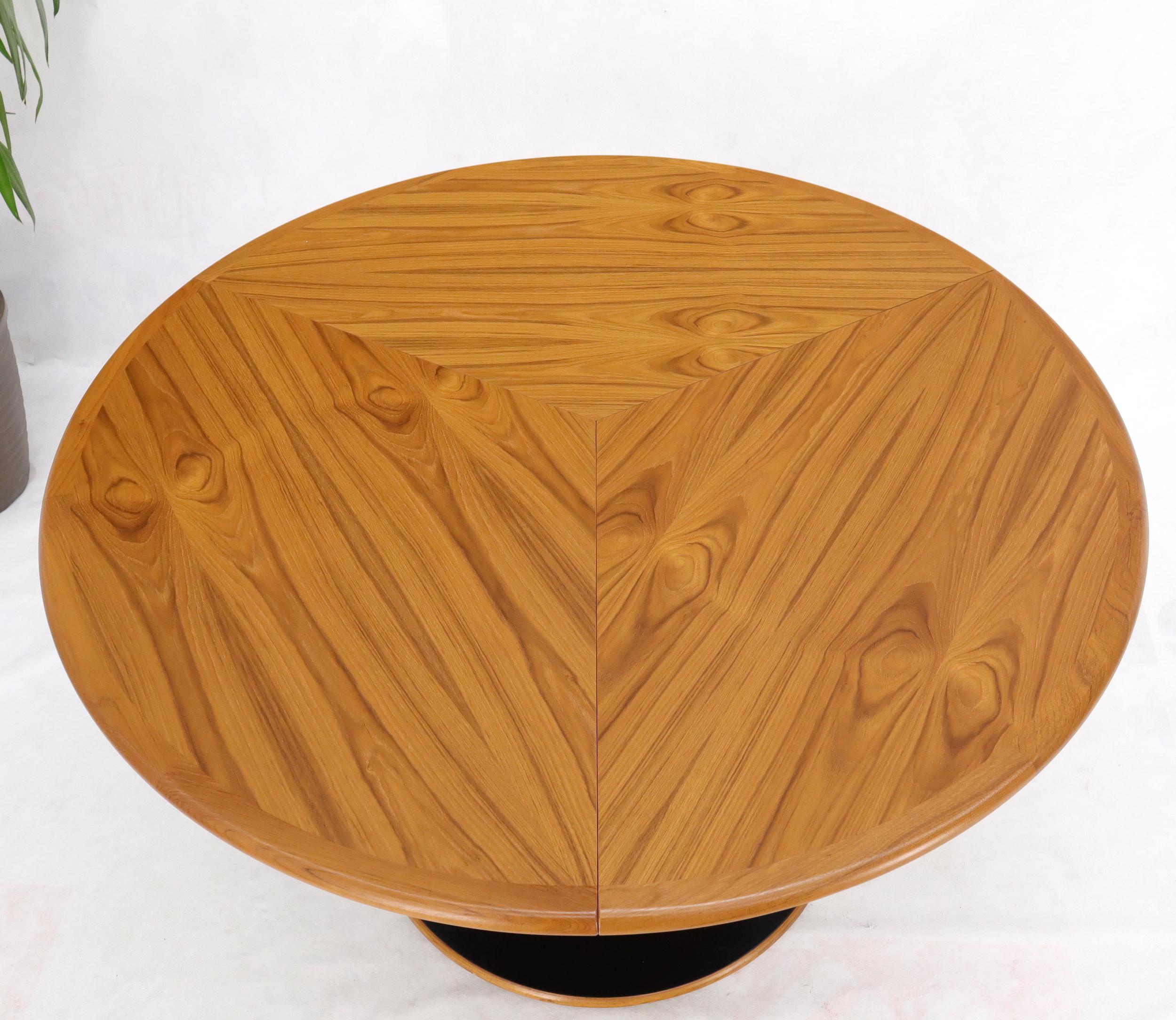 Lacquered Danish Teak Round Expandable Table with Three Self Storing Leaves