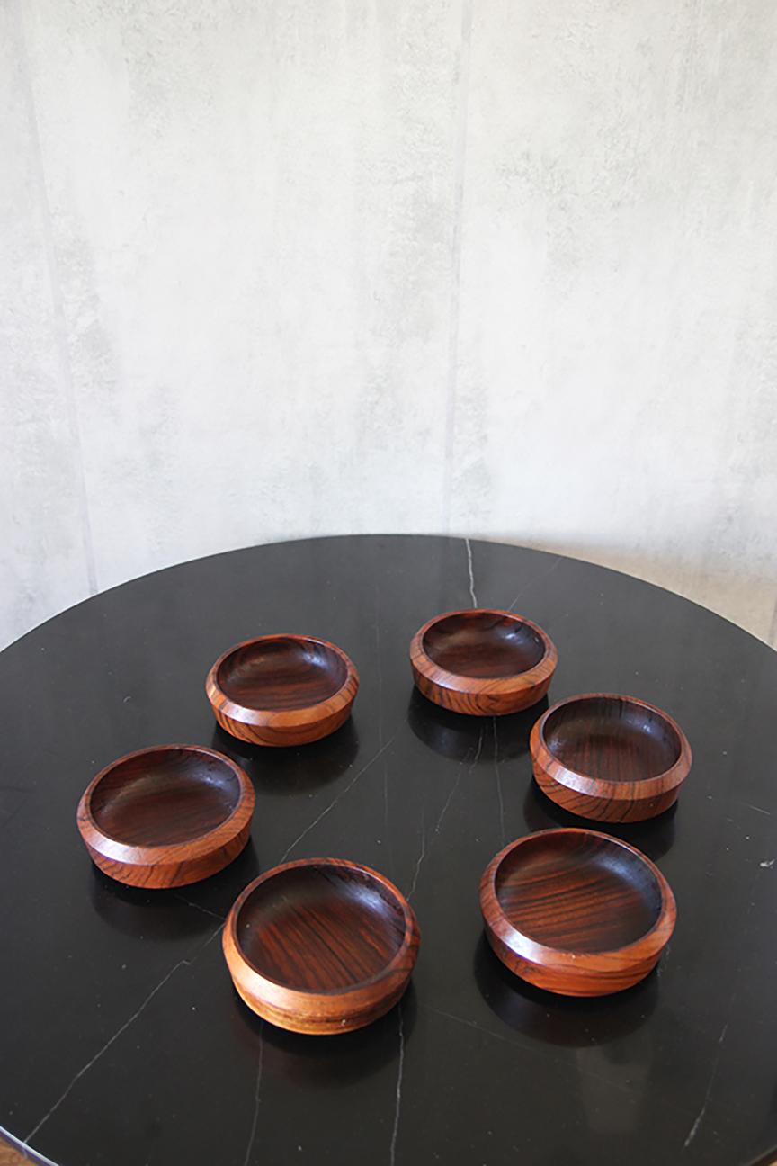 A lovely Set of 6 Danish Modern teak side bowls. 
A very clean and popular design - all functional and stylish in Danish Design.
