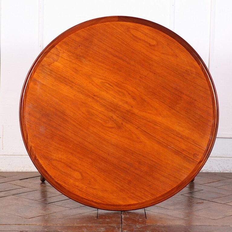 Danish teak side table by Anton Kildeberg ‘Model 183’. Top with sculpted edge and raised on three tapering canted legs. C.1960’s.