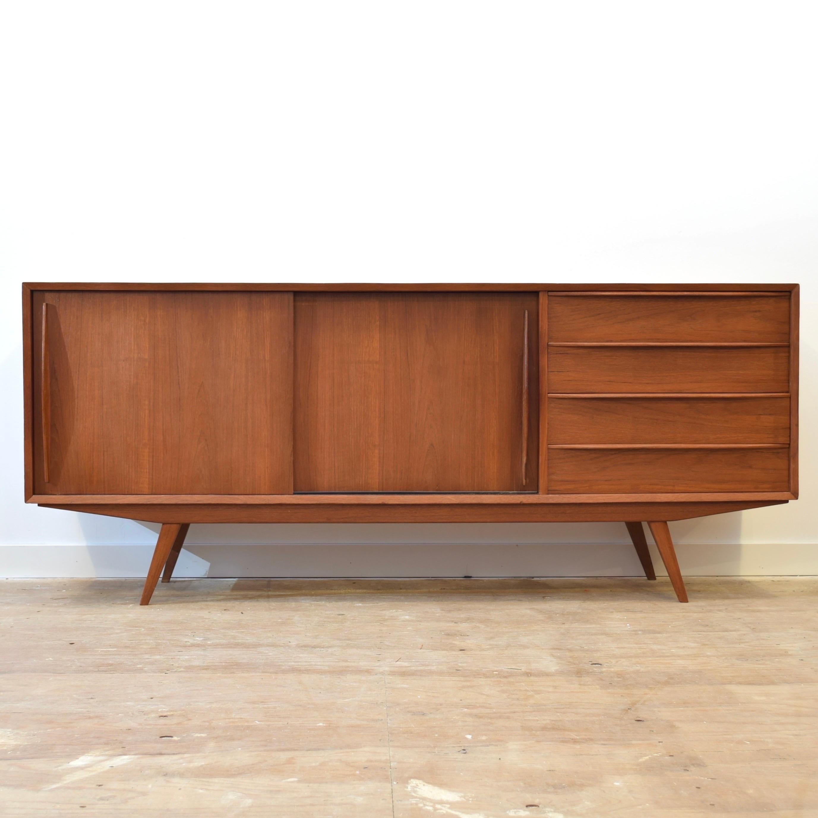 Condition: Refinished

Dimensions: 72” L x 16.5” D x 30.25” H

Description: A refinished vintage teak sideboard. Likely made in Denmark, circa 1960s. In excellent condition. One mark on surface shown in last two photos. Mark is visible in person