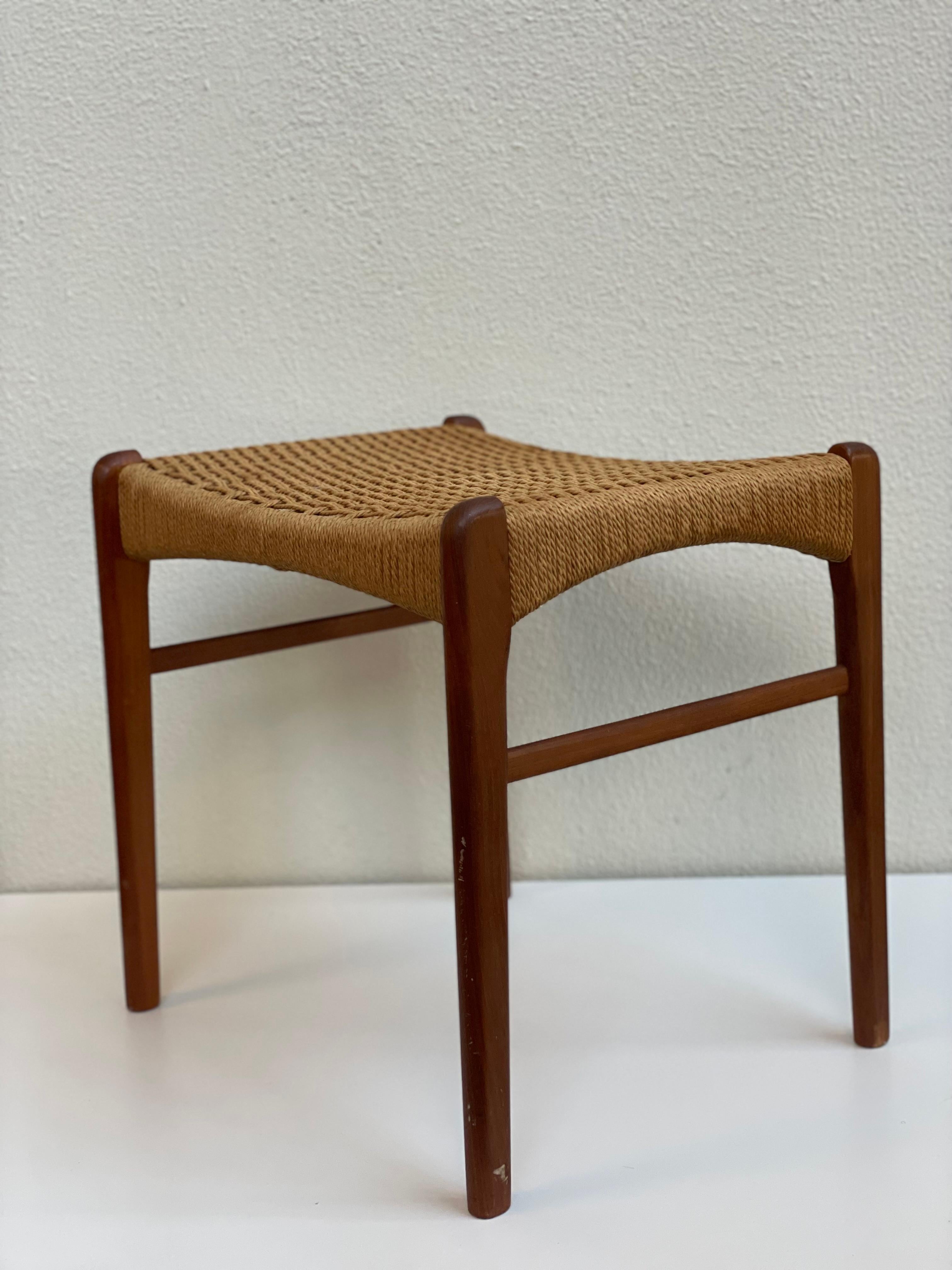 Beautiful Danish teak stool by Peder Kristensen for Glyngore Stolefabrik. Simple yet intricate design with he weave.