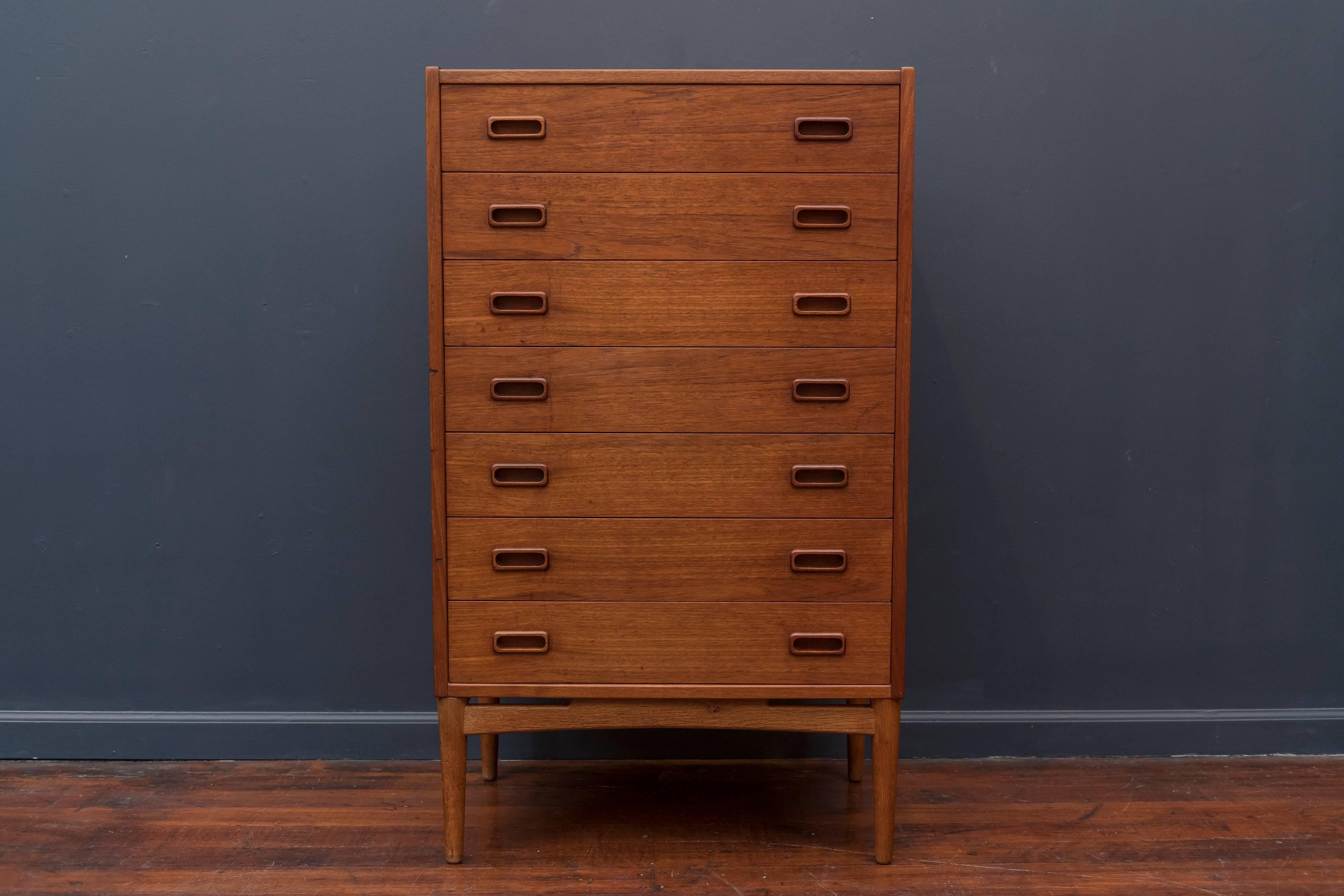High quality Danish teak seven drawer tall chest, in very good original condition.