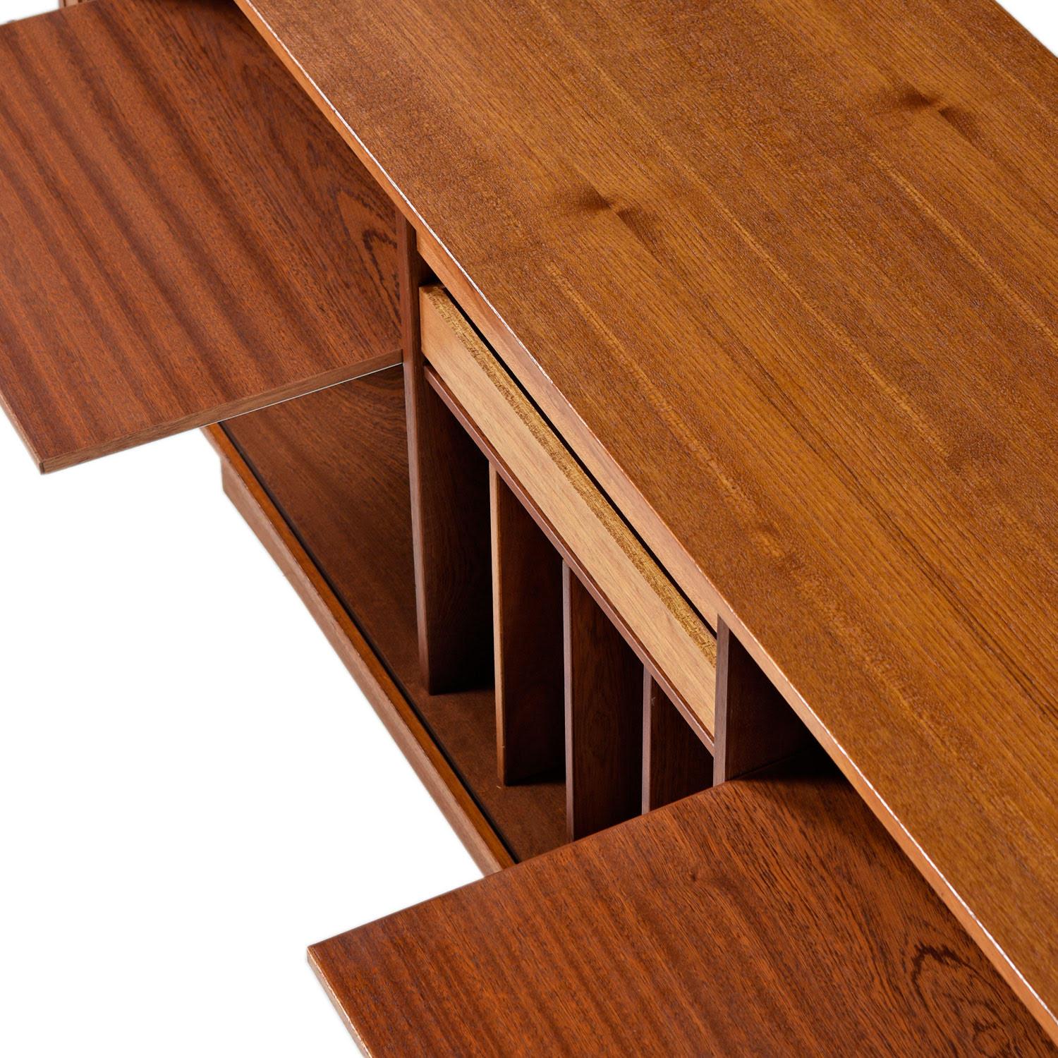 Concealing storage is a breeze with this versatile teak credenza. If you are looking for a media console, this is what you've been waiting for! We do not often come across credenza's that are configured for electronics. Most of our clients tend to