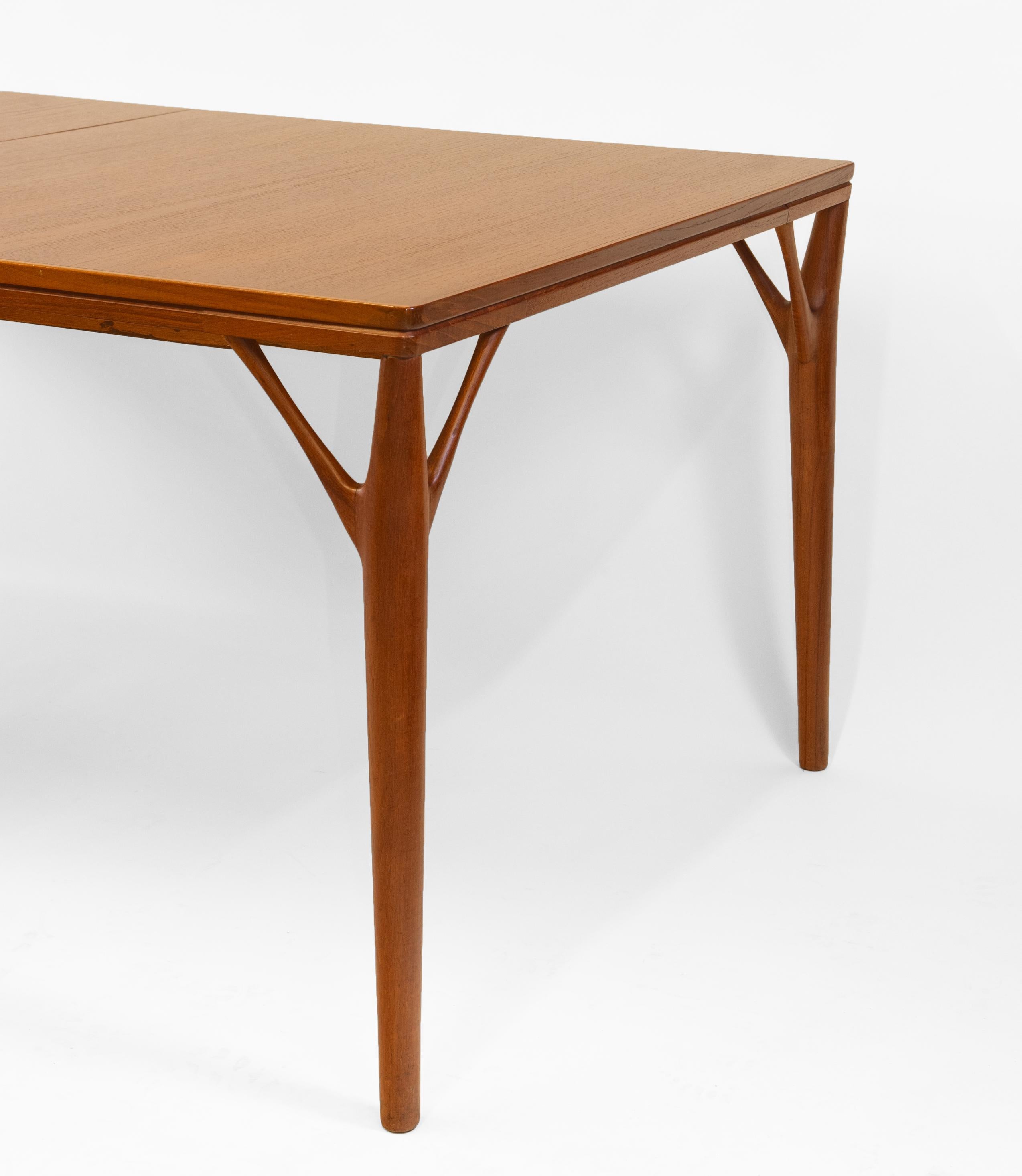 Scandinavian Modern Danish Teak ‘Tree Leg’ Mid Century Extending Large Dining Table By H Sigh & Sons For Sale