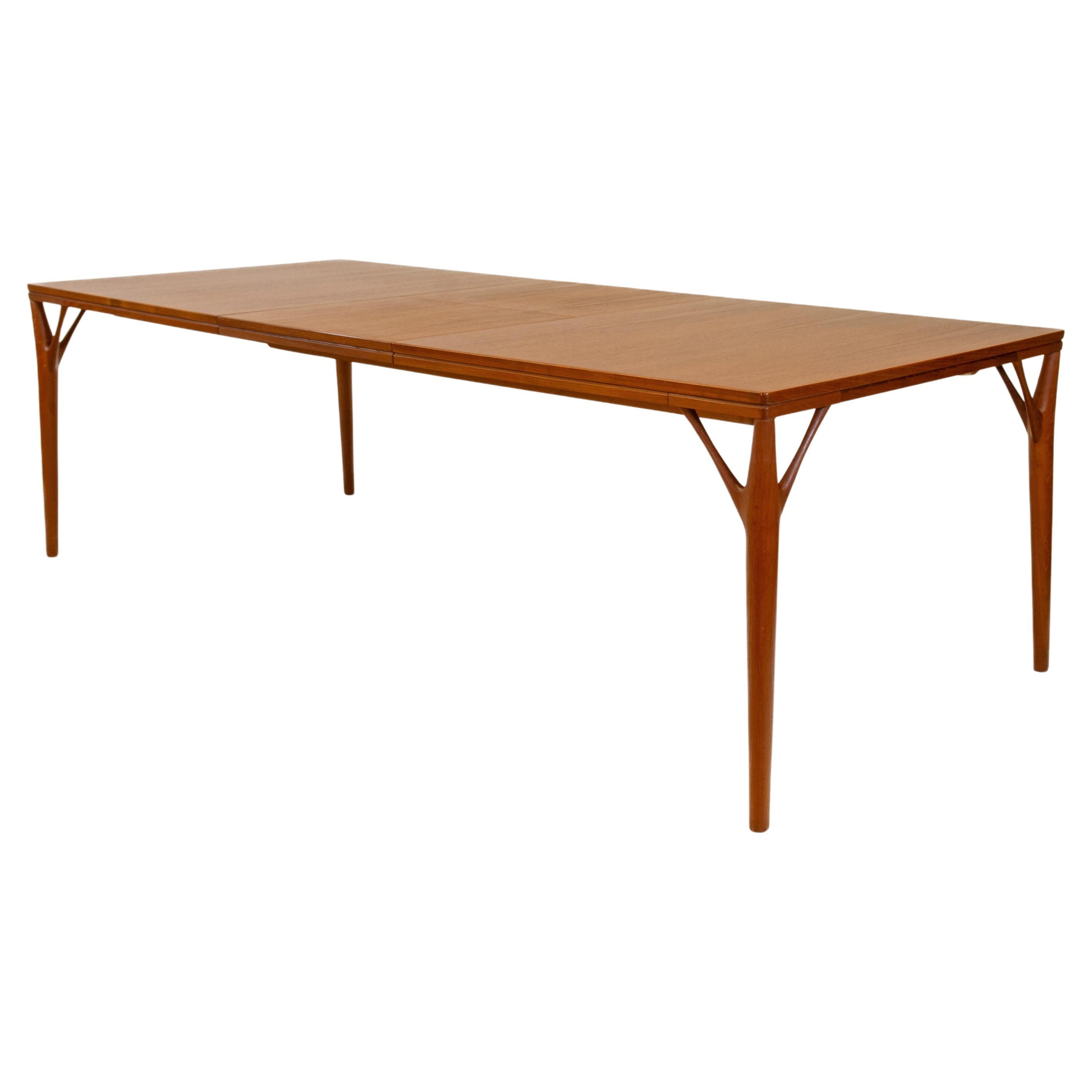 Danish Teak ‘Tree Leg’ Mid Century Extending Large Dining Table By H Sigh & Sons For Sale