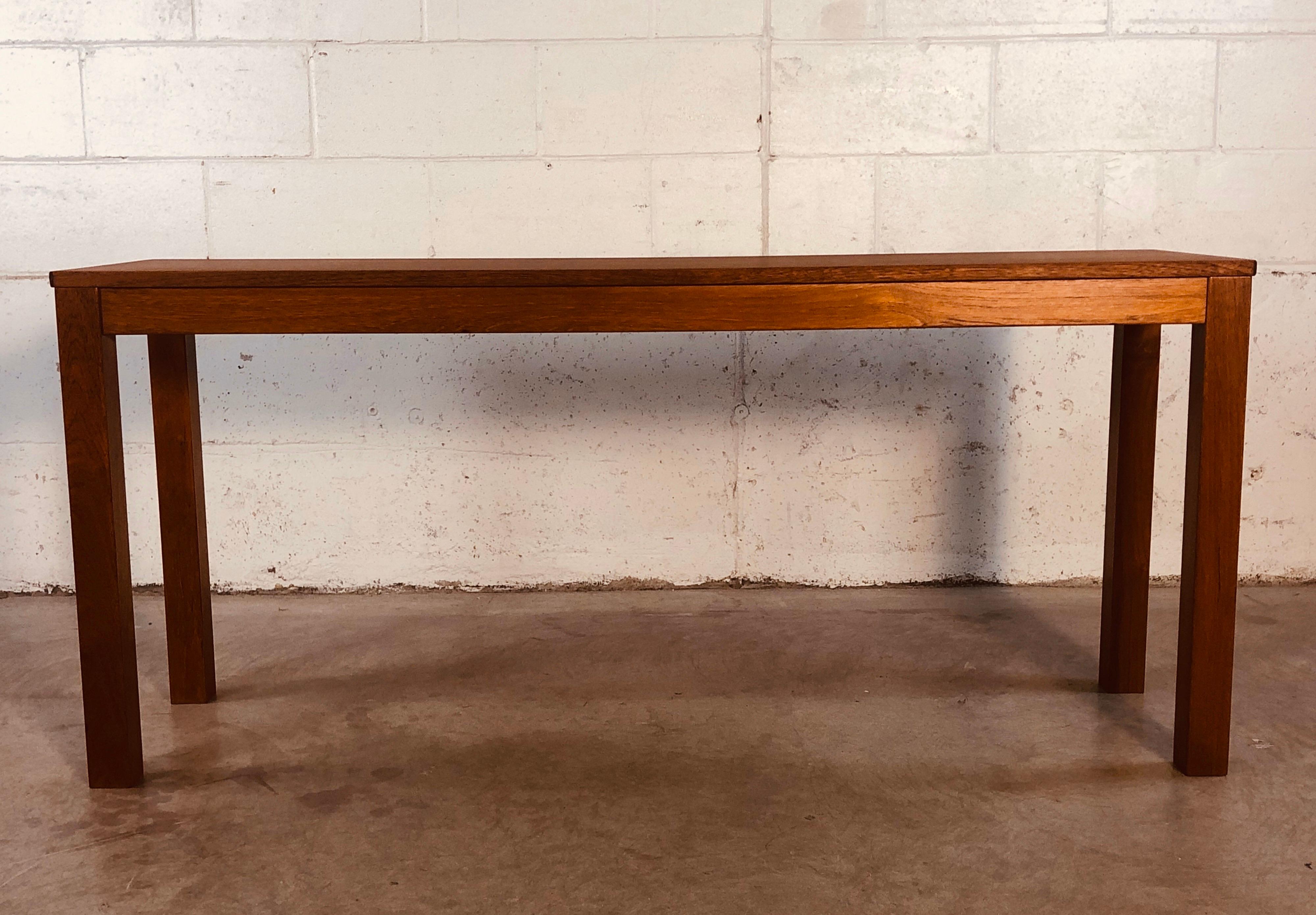 1970s Danish teak console table by Trioh. The table is in excellent refinished condition. Marked underneath.