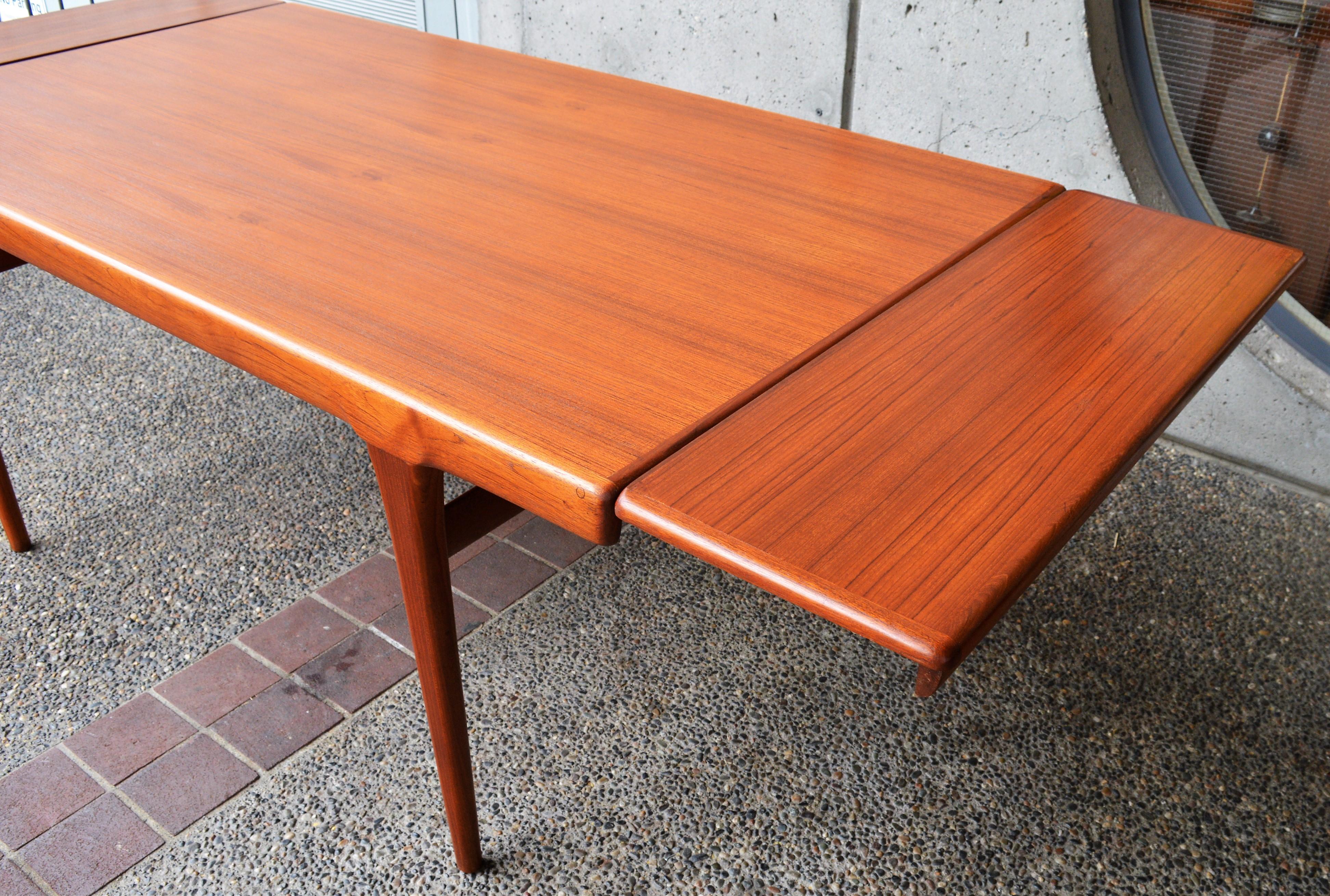 Danish Teak Two-Leaf Dining Table by Kofod Larsen with His Iconic Leg Detail 8
