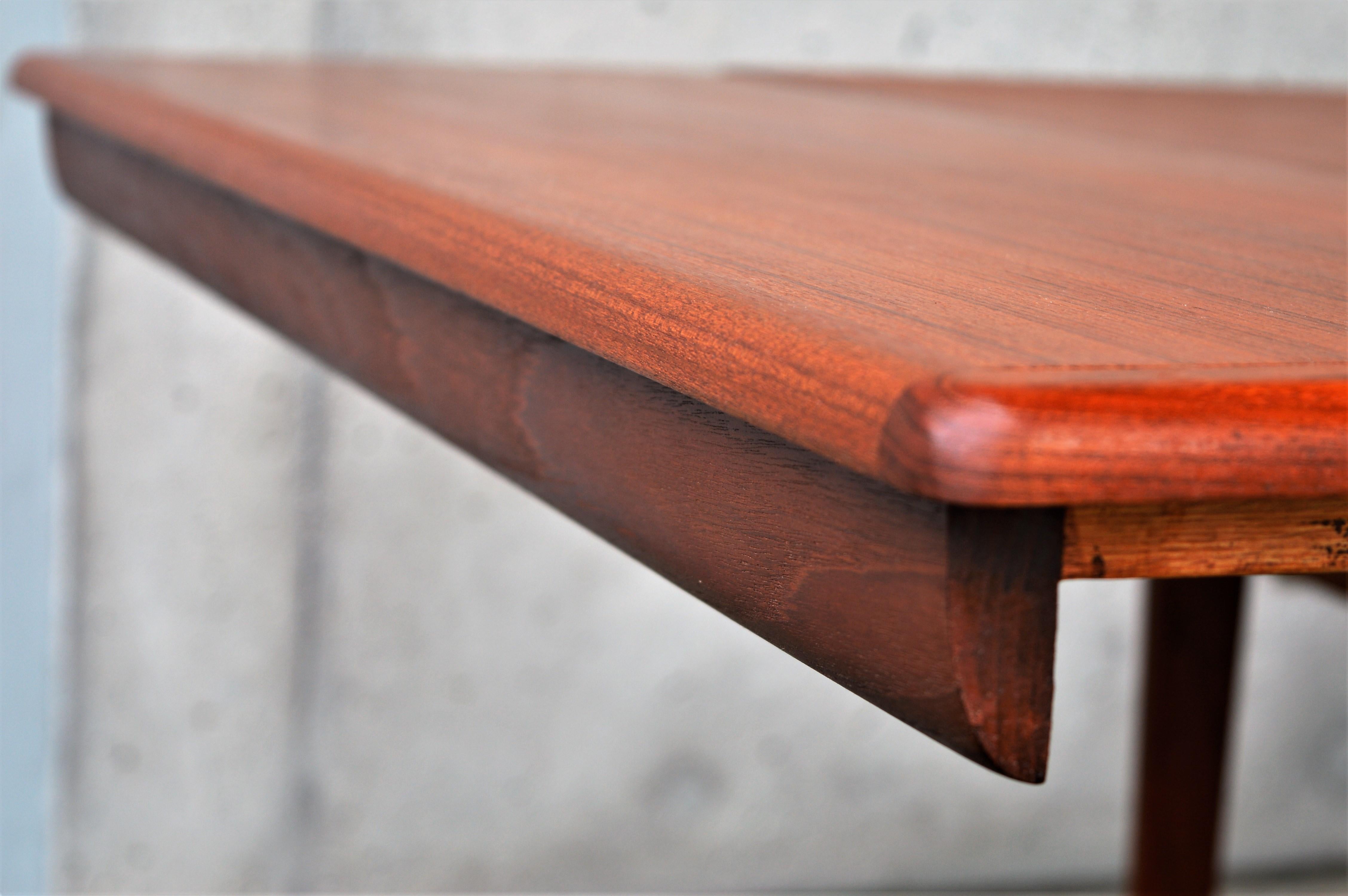 Danish Teak Two-Leaf Dining Table by Kofod Larsen with His Iconic Leg Detail 9