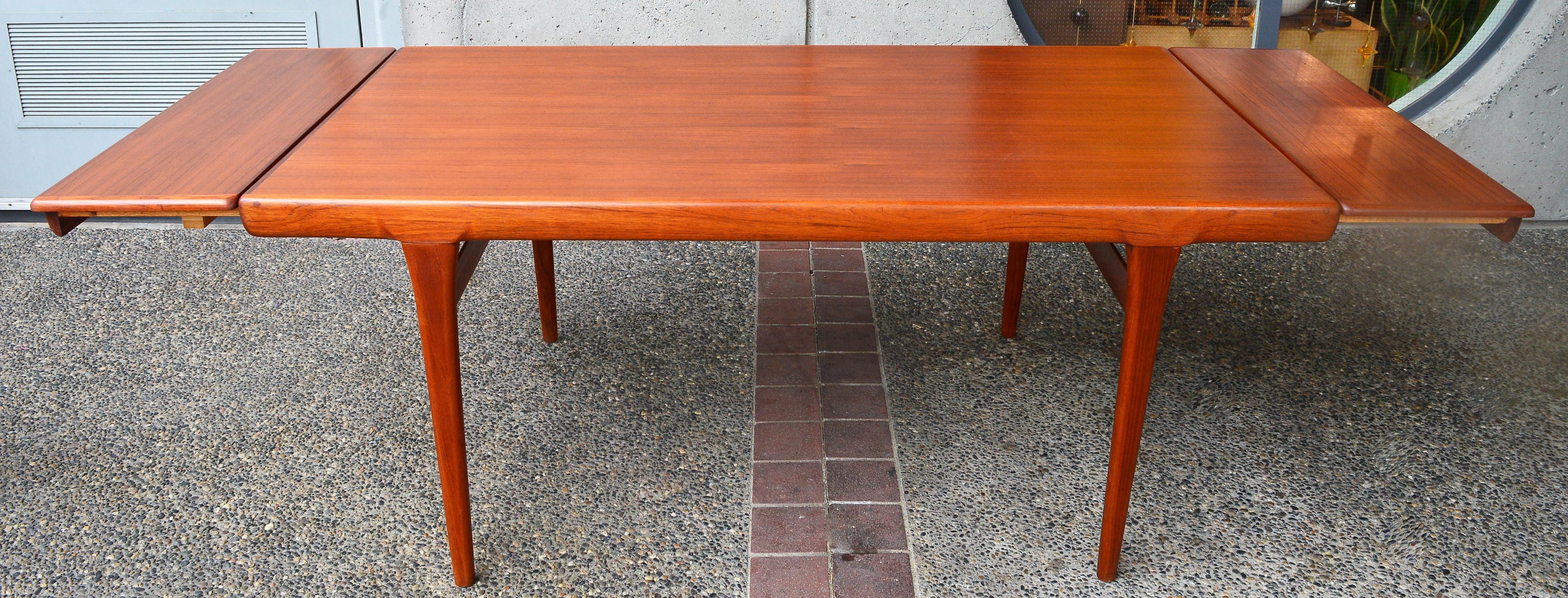 Danish Teak Two-Leaf Dining Table by Kofod Larsen with His Iconic Leg Detail 10