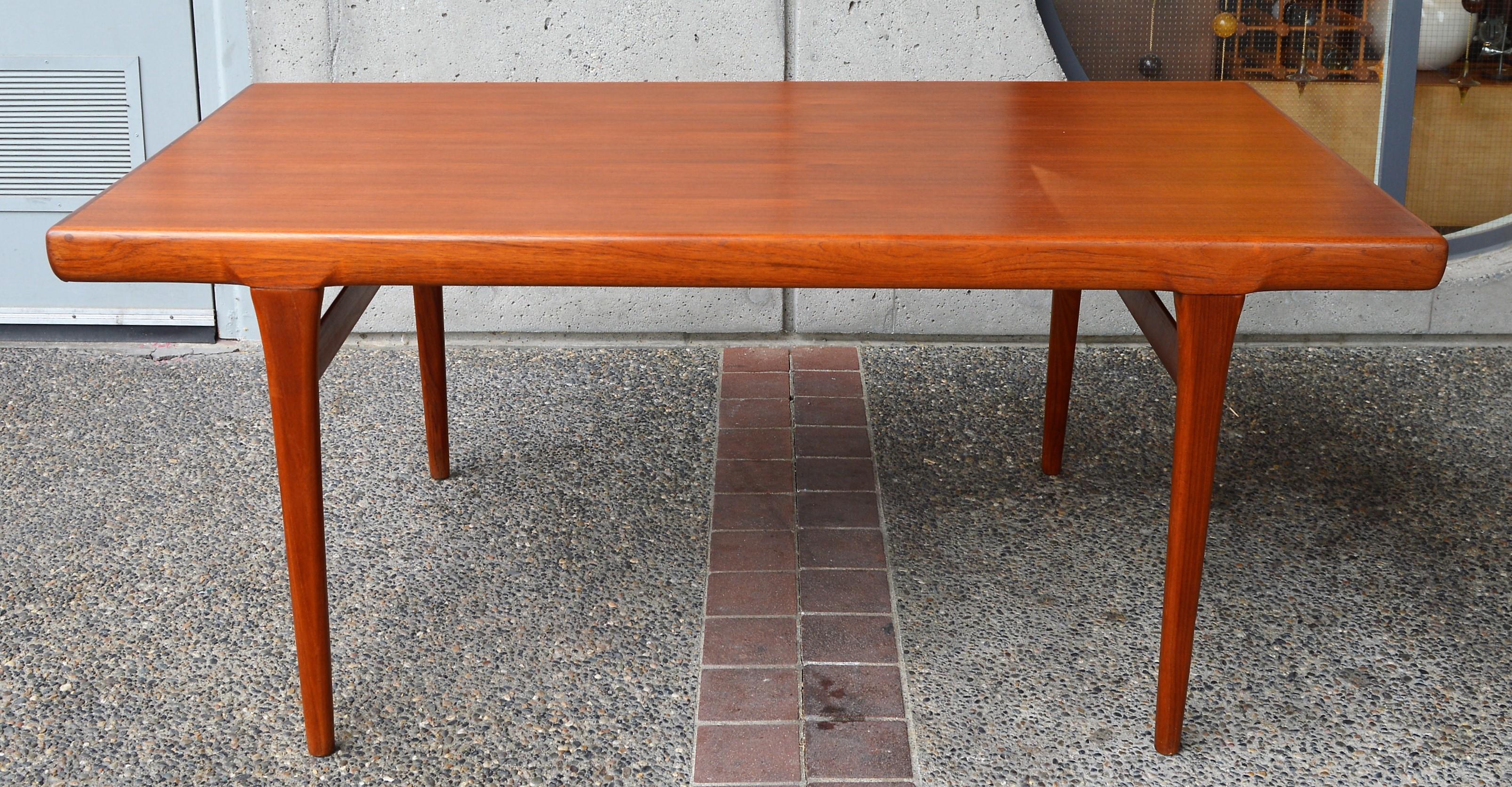 Danish Teak Two-Leaf Dining Table by Kofod Larsen with His Iconic Leg Detail In Excellent Condition In New Westminster, British Columbia
