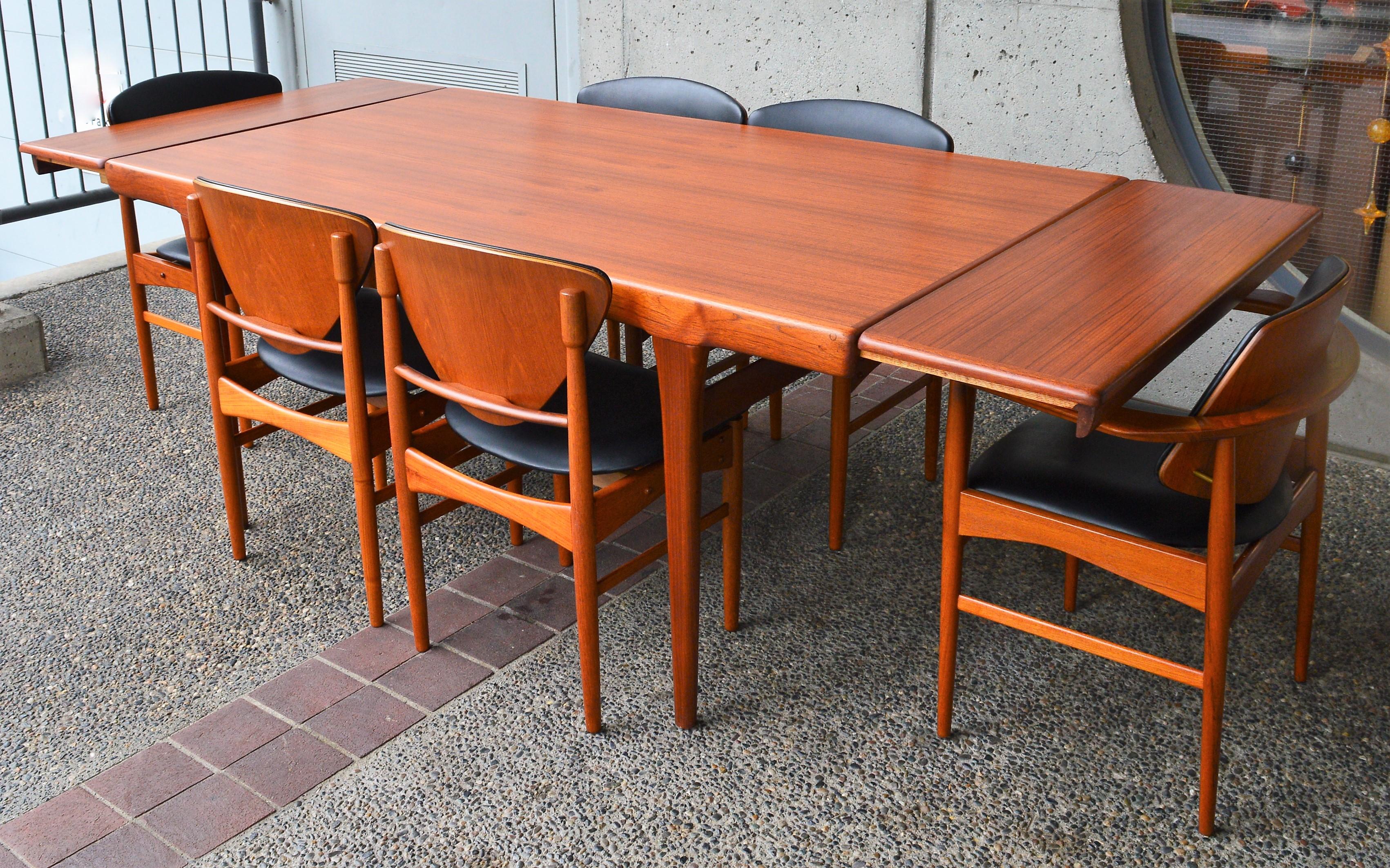 Danish Teak Two-Leaf Dining Table by Kofod Larsen with His Iconic Leg Detail 2