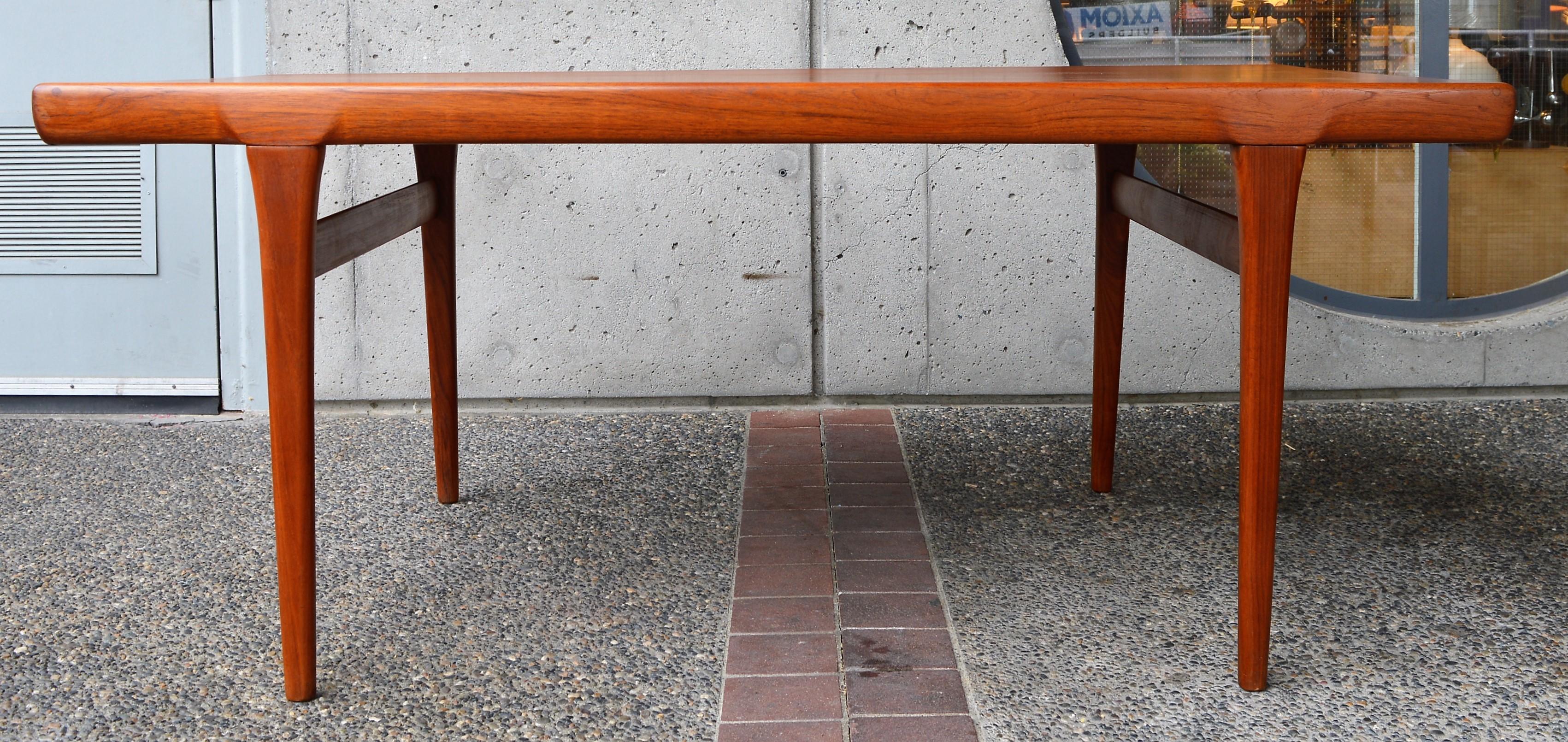 Danish Teak Two-Leaf Dining Table by Kofod Larsen with His Iconic Leg Detail 3