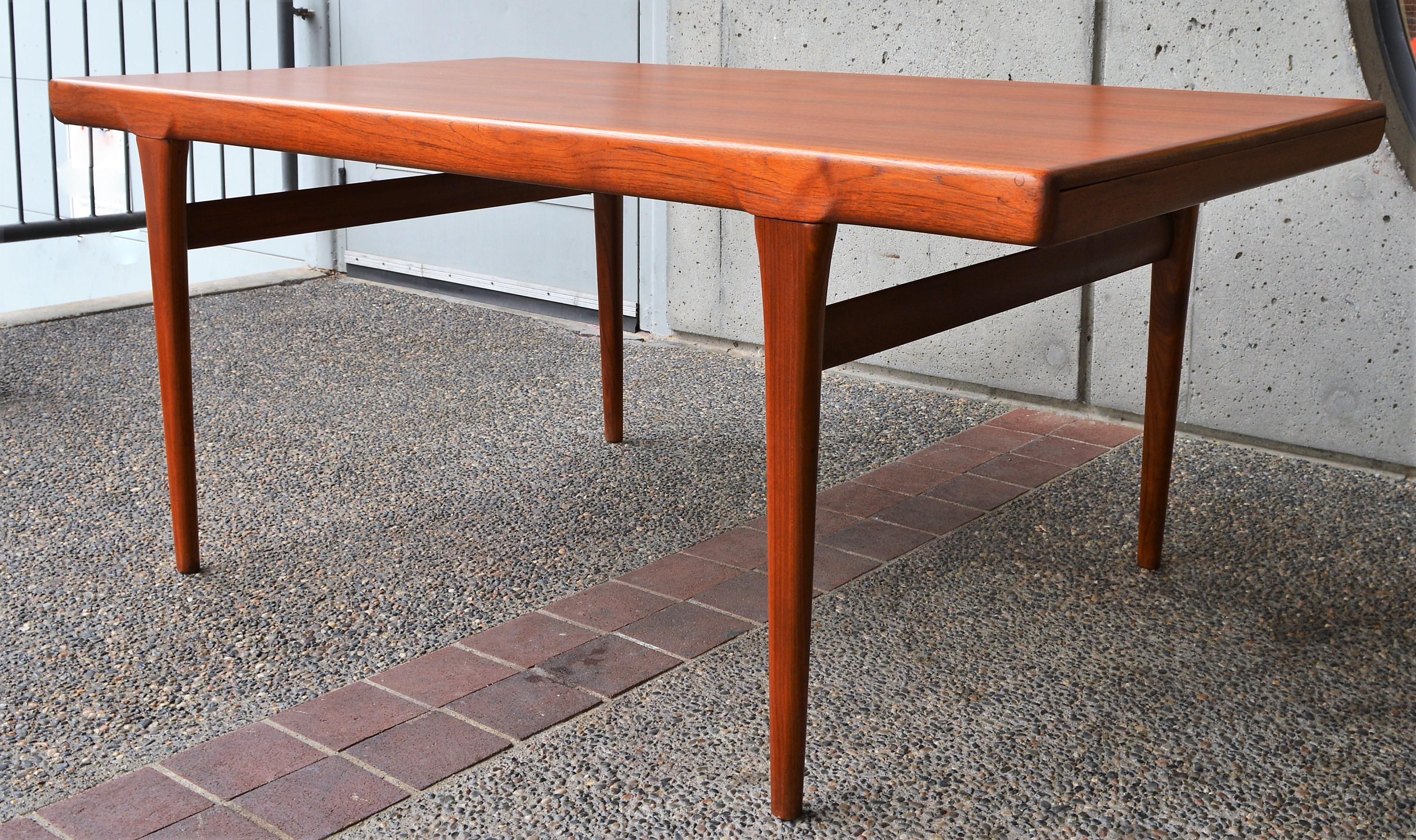 Danish Teak Two-Leaf Dining Table by Kofod Larsen with His Iconic Leg Detail 4
