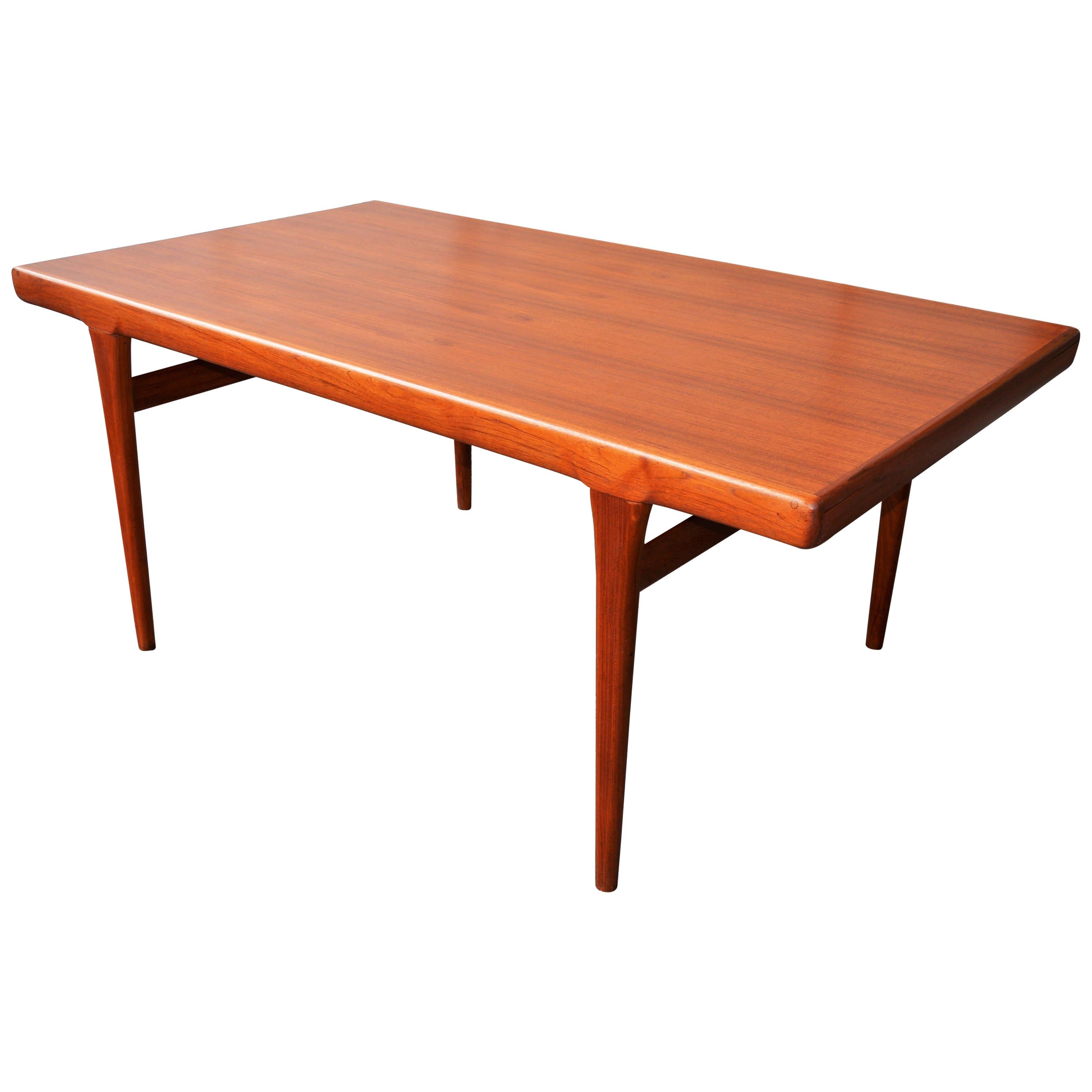 Danish Teak Two-Leaf Dining Table by Kofod Larsen with His Iconic Leg Detail