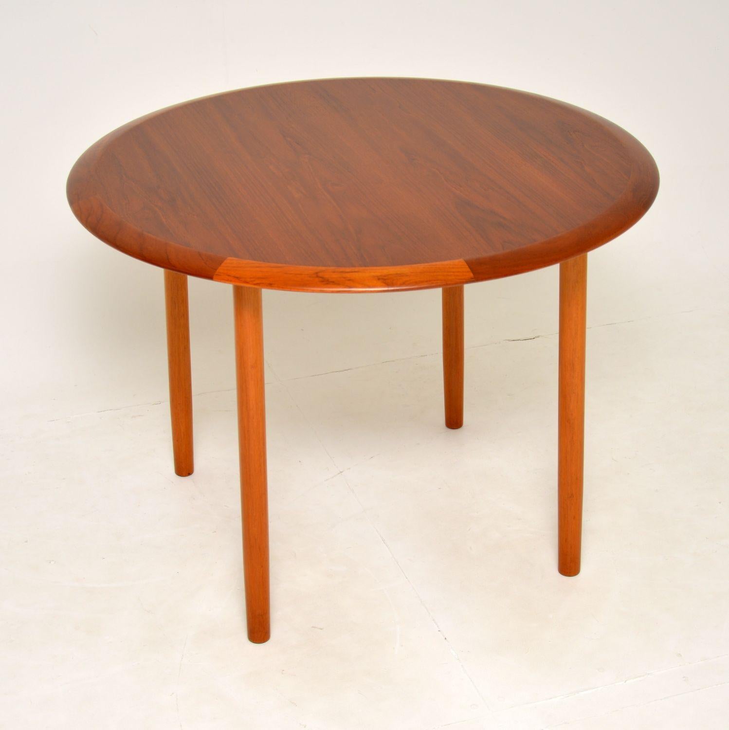 A stunning vintage Danish dining table in teak. This was made in Denmark by France & Son in the 1960’s, it was most likely designed by Peter Hvidt & Orla Molgaard-Nielsen.

The quality is amazing and this is a useful size, not too imposing and