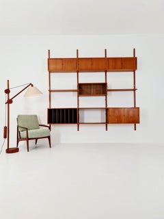 Unité murale danoise en teck avec 5  armoires  par Poul Cadovius pour Cado, Danemark, 1960