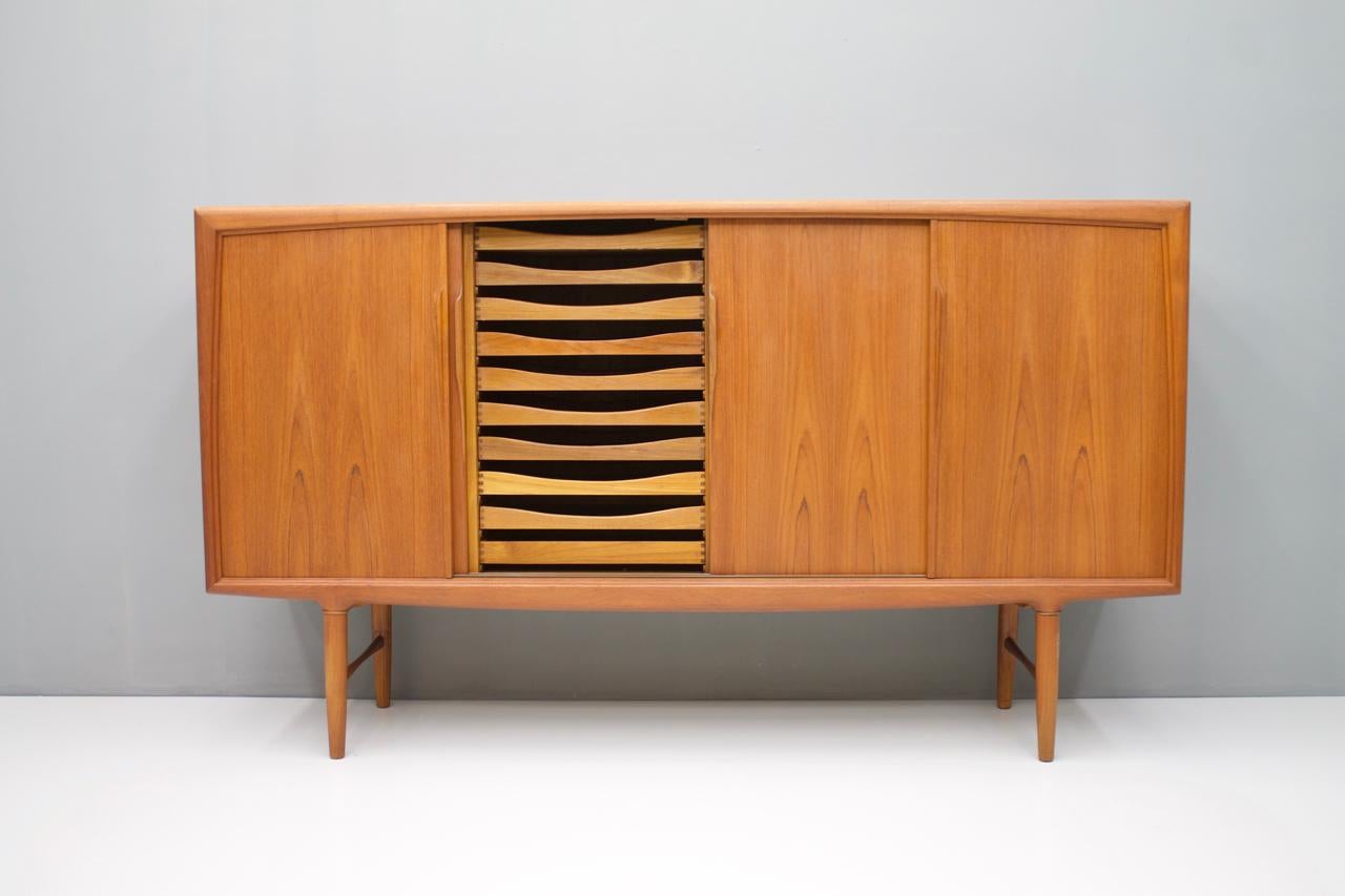 Very nice teak sideboard by Axel Christensen for ACO Mobler, Denmark with a total of 4 sliding doors. Inside there are 10 drawers.
Very good restored condition.