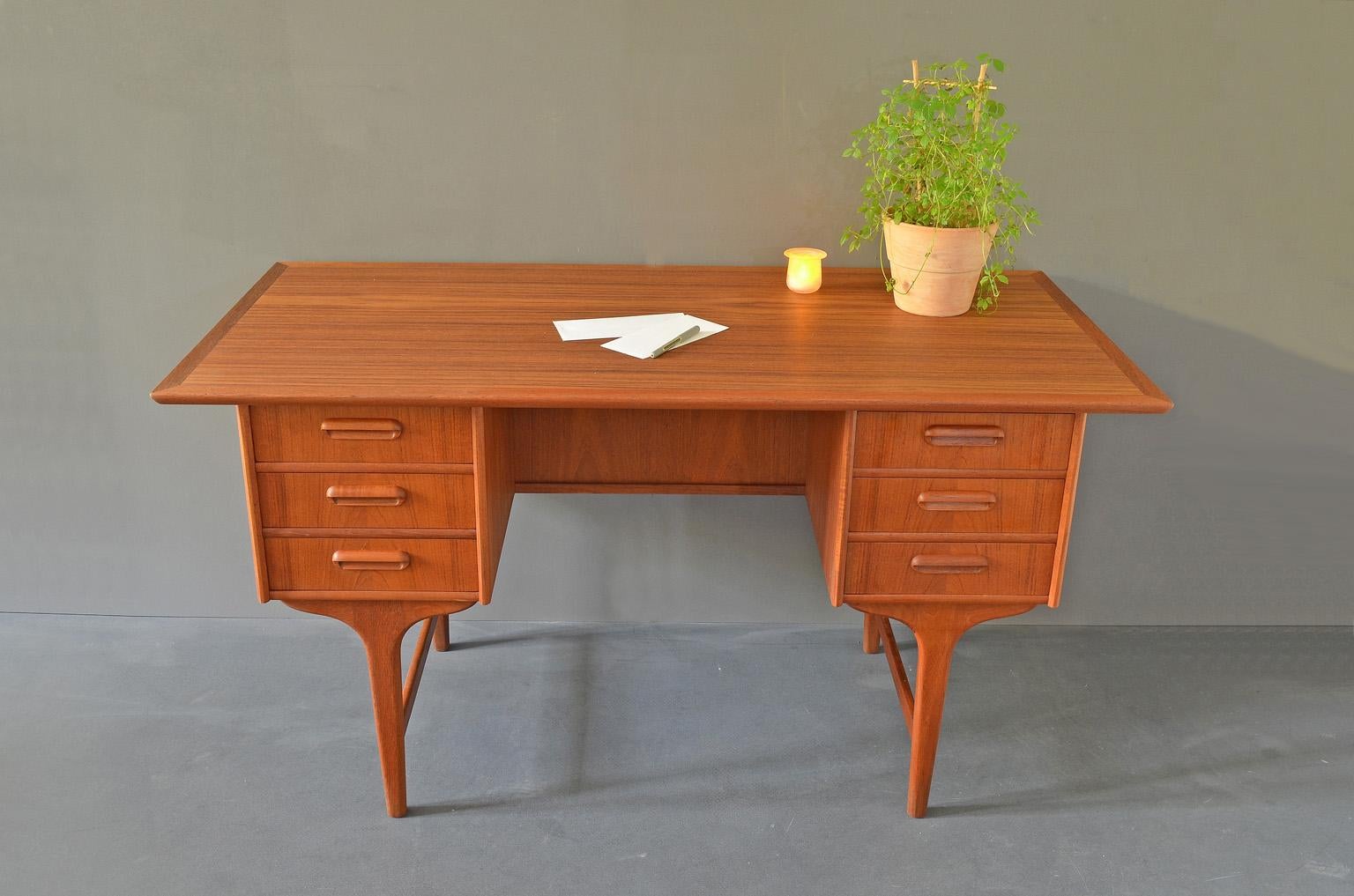 This Danish teak writing desk by Gunnar Nielsen Tibergaard was produced in Denmark in the 1960s.
 