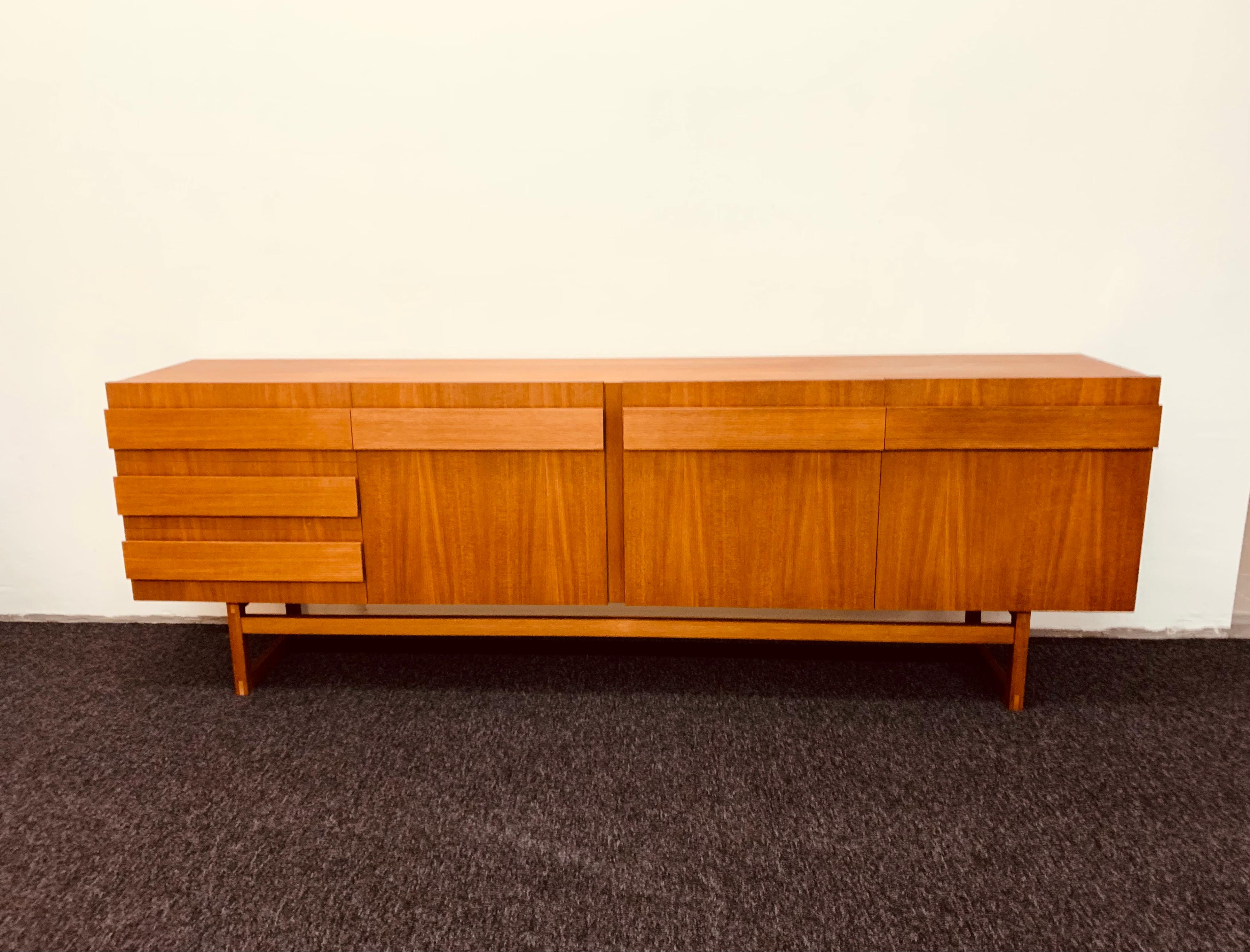 Exceptionally beautiful Danish teak sideboard from the 1960s.
Very high quality workmanship and elegant design.

Condition:

Very good vintage condition with slight signs of age-related wear.
The surface has been lovingly reworked.
Minor signs of