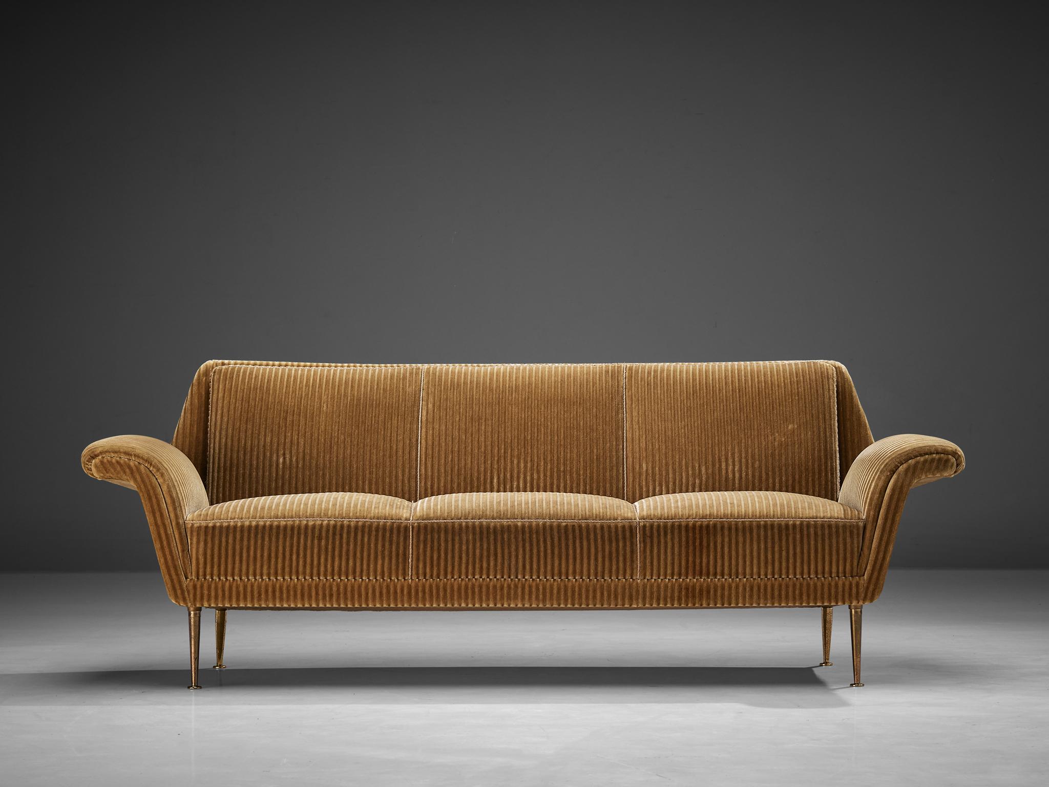 Sofa, corduroy, brass, Denmark, 1960s

Characteristic Danish Mid-Century sofa with fair yet striking lines. The way the armrests bent outwards remind of the designs by Folke Ohlsson. Note the sofa's majestic construction as shown in the seating