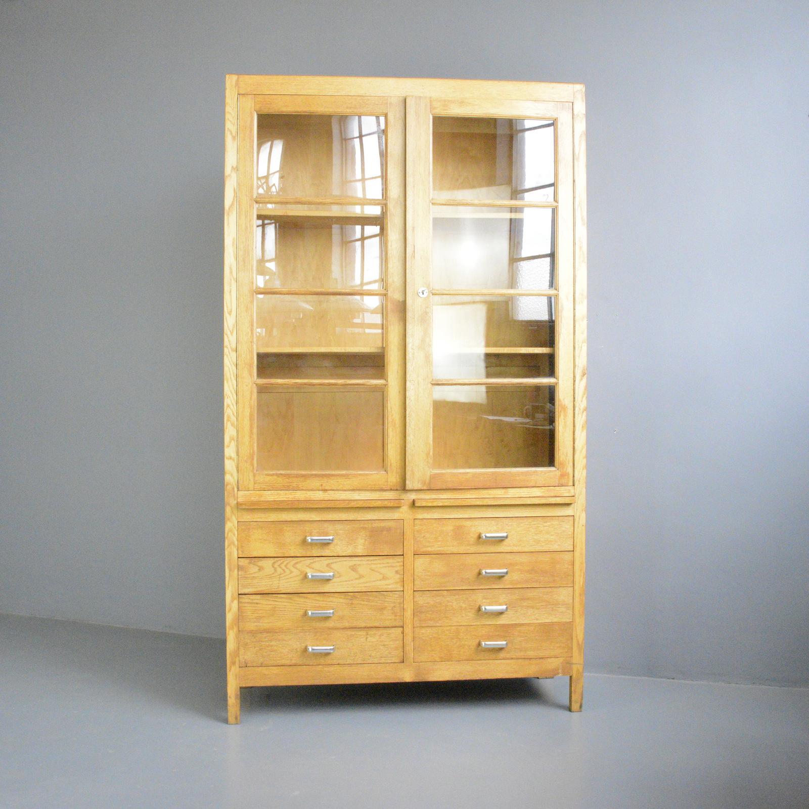 - Solid Beech with glass doors
- 2 shelves and 8 drawers
- Original lock and key
- Originally from a university library
- Danish ~ 1950s
- 130cm wide x 44cm deep x 230cm tall

Condition Report

All drawers run smoothly along with the lock