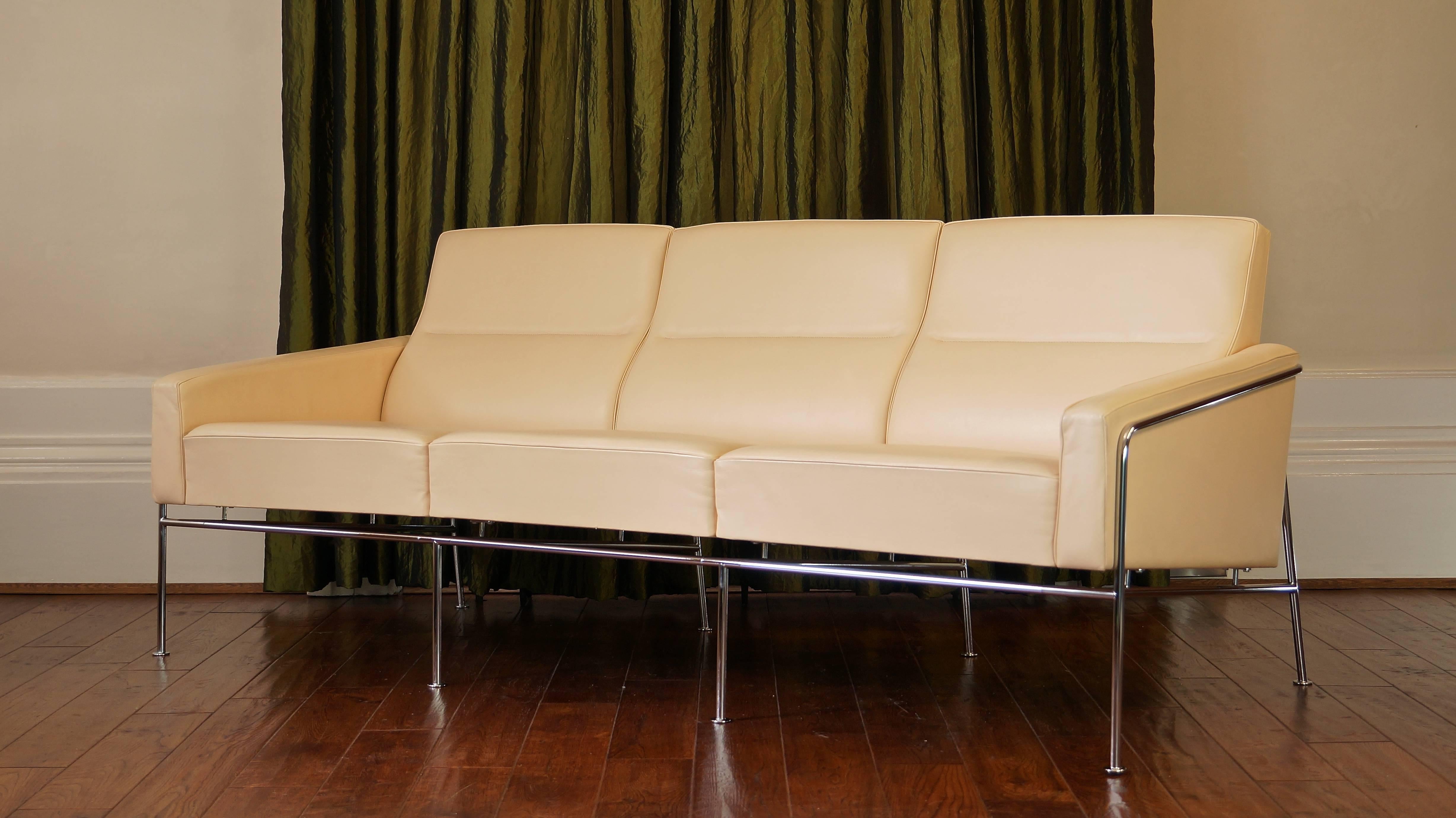 Arne Jacobsen series 3303 sofa in premium cream leather. 

This classic sofa offers both a clean, modern look and incredibly comfortable seating. The leather is in excellent condition with only light signs of use.

A number of matching chairs