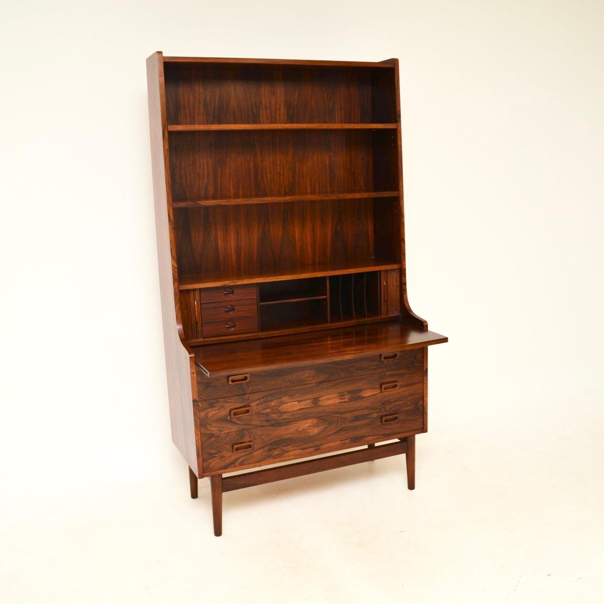 An absolutely stunning Danish vintage bureau bookcase by Johannes Sorth. This was made in Denmark, it is stamped and dated from 1972.

The quality is outstanding, this has incredibly beautiful grain patterns and has some lovely features. The lower