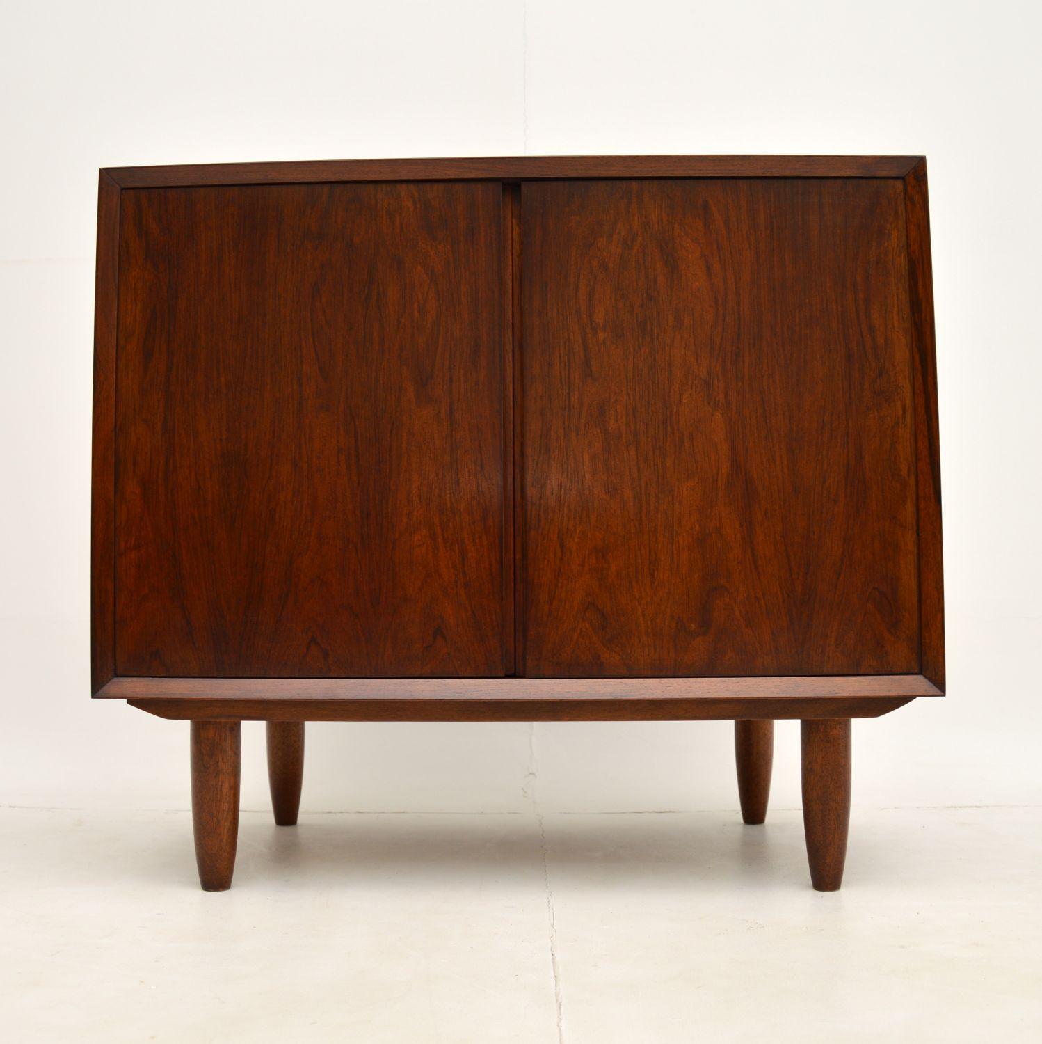 A stunning and top quality vintage Danish cabinet. This was made in Denmark in the 1960’s, it was designed by Poul Cadovius.

It’s is a great size and is extremely well made. The wood grain patterns are beautiful throughout, even on the