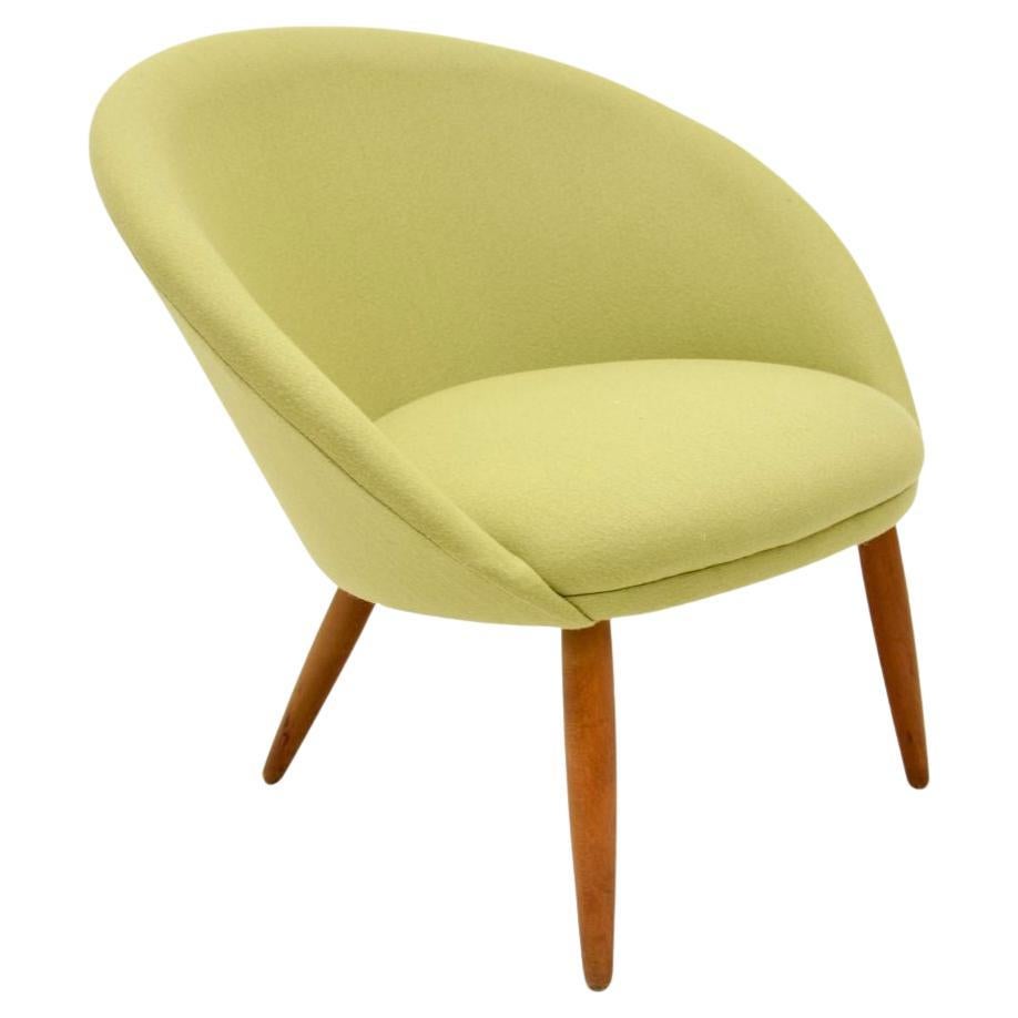 A stylish and very comfortable Danish vintage cocktail chair. This was recently imported from Denmark, it dates from the 1950’s.

It is of fantastic quality and is a lovely size. The tub shaped seat sits on beautifully tapered legs, this looks great