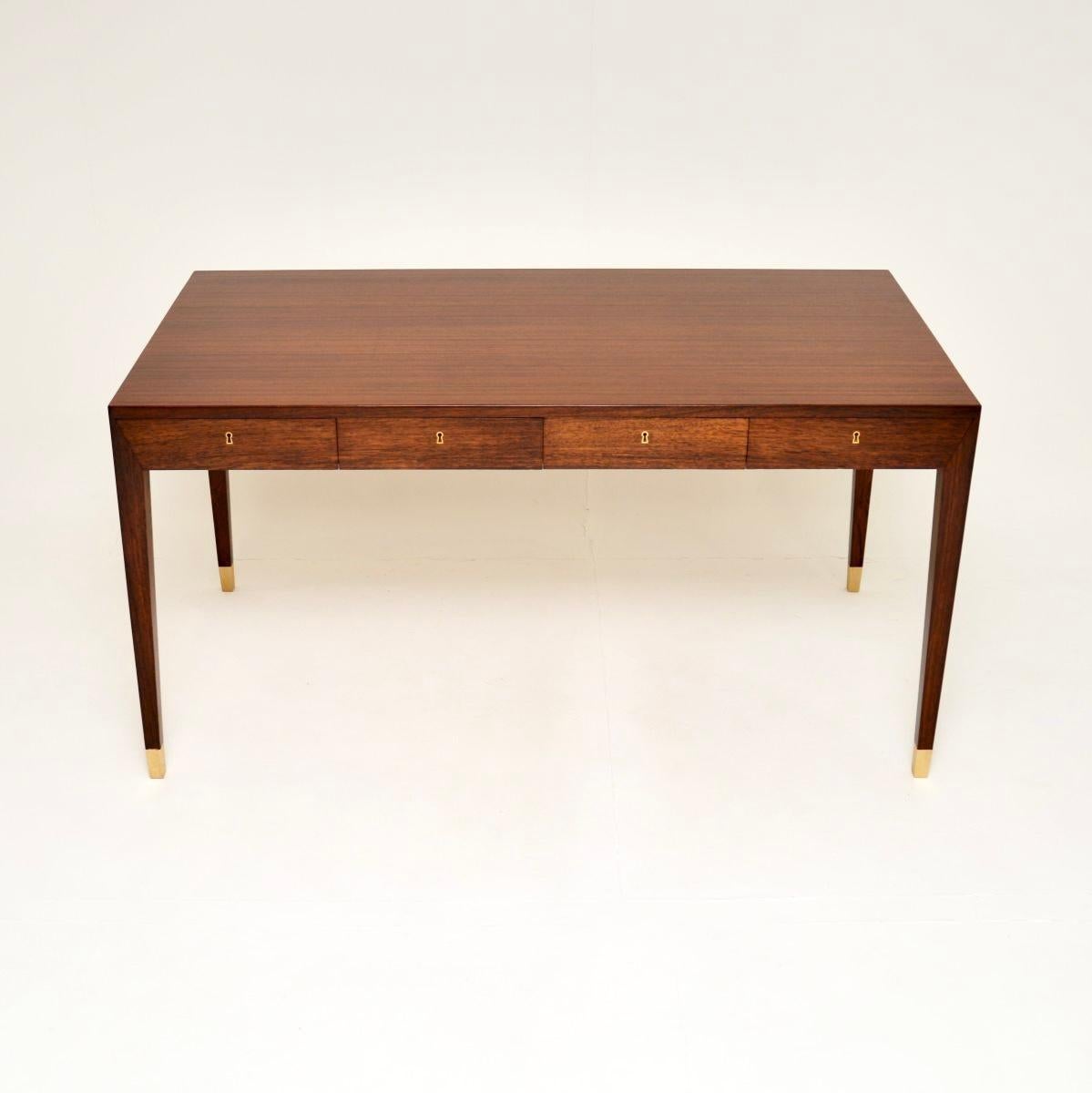 A stylish and iconic Danish vintage desk by Severin Hansen for Haslev. It was made in Denmark, and dates from the 1960’s.

It is of outstanding quality and has a beautiful design. The wood has a gorgeous colour tone and wonderful grain patterns, the
