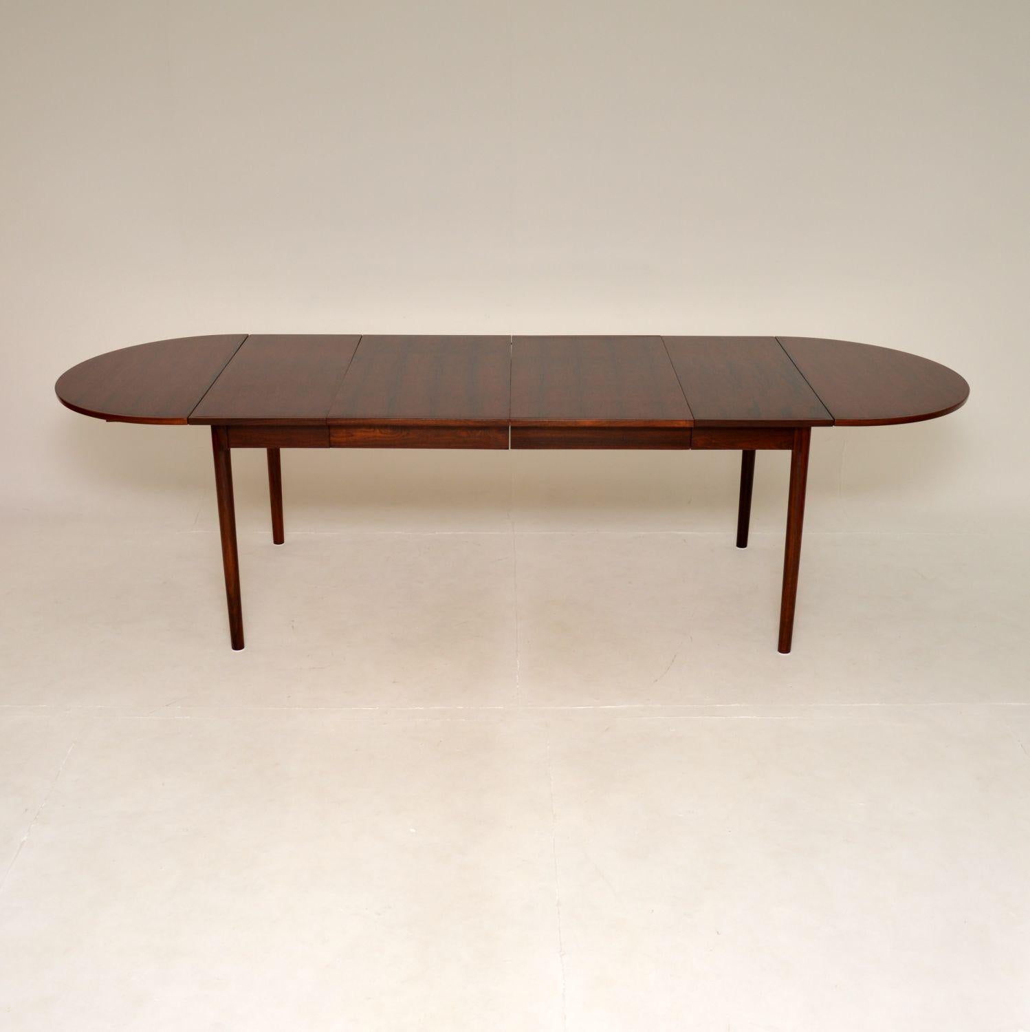 A stunning and rare Danish vintage dining table by Arne Vodder. This is the model 227 table, it was made in Denmark and dates from the 1960’s.

It is very well made, the quality is superb. This has stunning grain patterns throughout, it has a