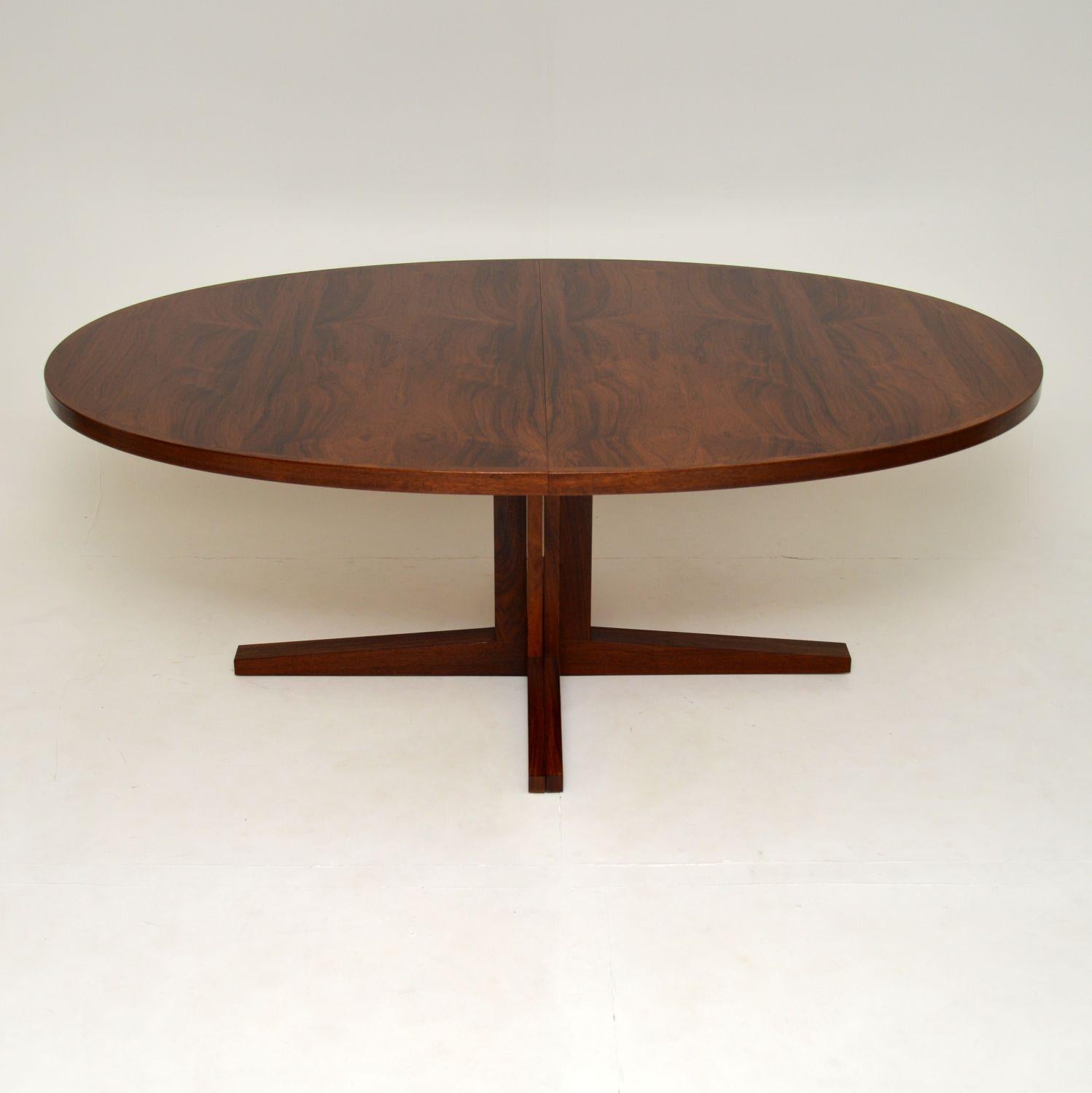 A superb and very large vintage Danish oval dining table, beautifully made from wood. This was designed by John Mortensen, it was made by Heltborg Mobler in Denmark around the 1960’s.

The quality is absolutely outstanding, and this is a great