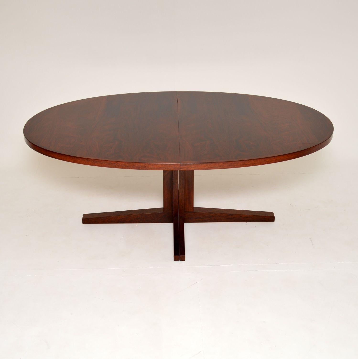 A very large, stylish and impressive vintage Danish oval dining table, beautifully made from wood. This was designed by John Mortensen, it was made by Heltborg Mobler in Denmark around the 1960’s.

The quality is absolutely outstanding, and it has