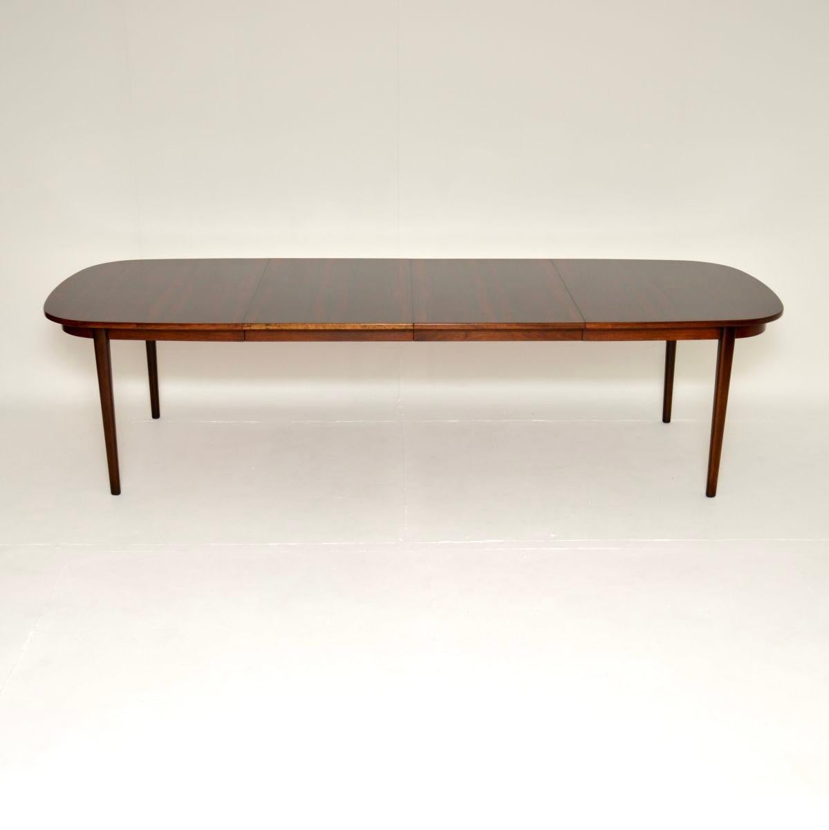 A stylish and incredibly well made Danish vintage dining table. It was recently imported from Denmark, it dates from the 1960’s.

The quality is outstanding, this is a great size and comes with two extension leaves that increase the surface area