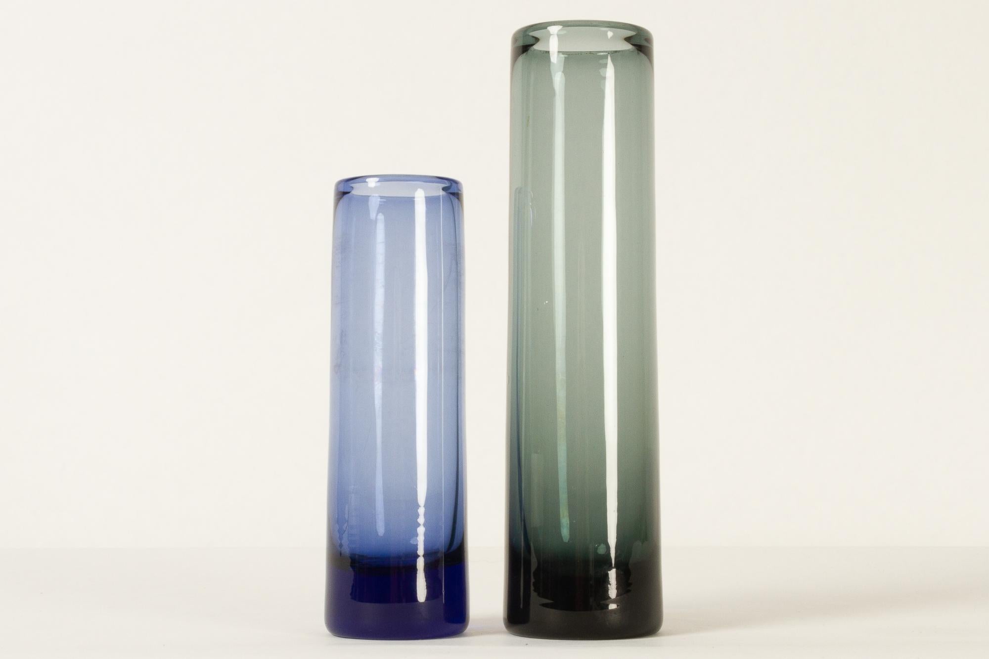 Danish vintage glass vases by Per Lütken for Holmegaard 1950s.
Pair of small torpedo shaped vintage vases in hand blown aqua blue and green glass designed by Danish designer Per Lütken in 1958. Model name 