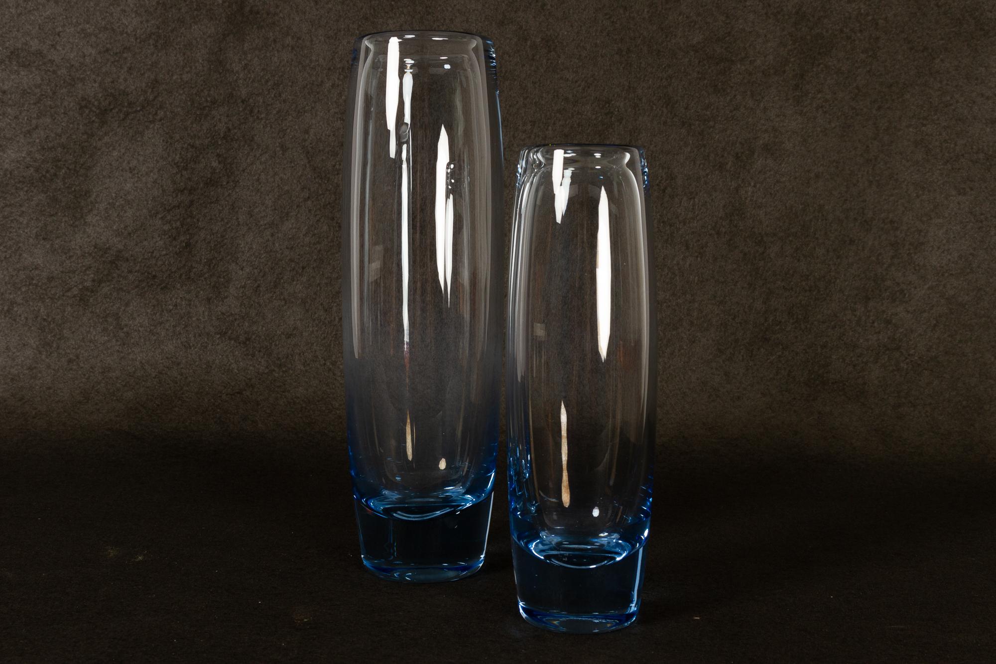 Danish Vvintage glass vases by Per Lütken for Holmegaard 1960s.
Pair of small torpedo shaped vintage vases in hand blown aqua blue glass designed by Danish designer Per Lütken in 1963.
Makers mark and artists initials etched in the bottom along