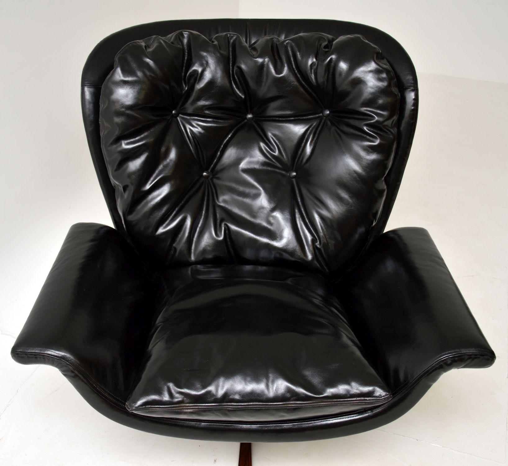 20th Century Danish Vintage Leather & Wood Swivel Armchair