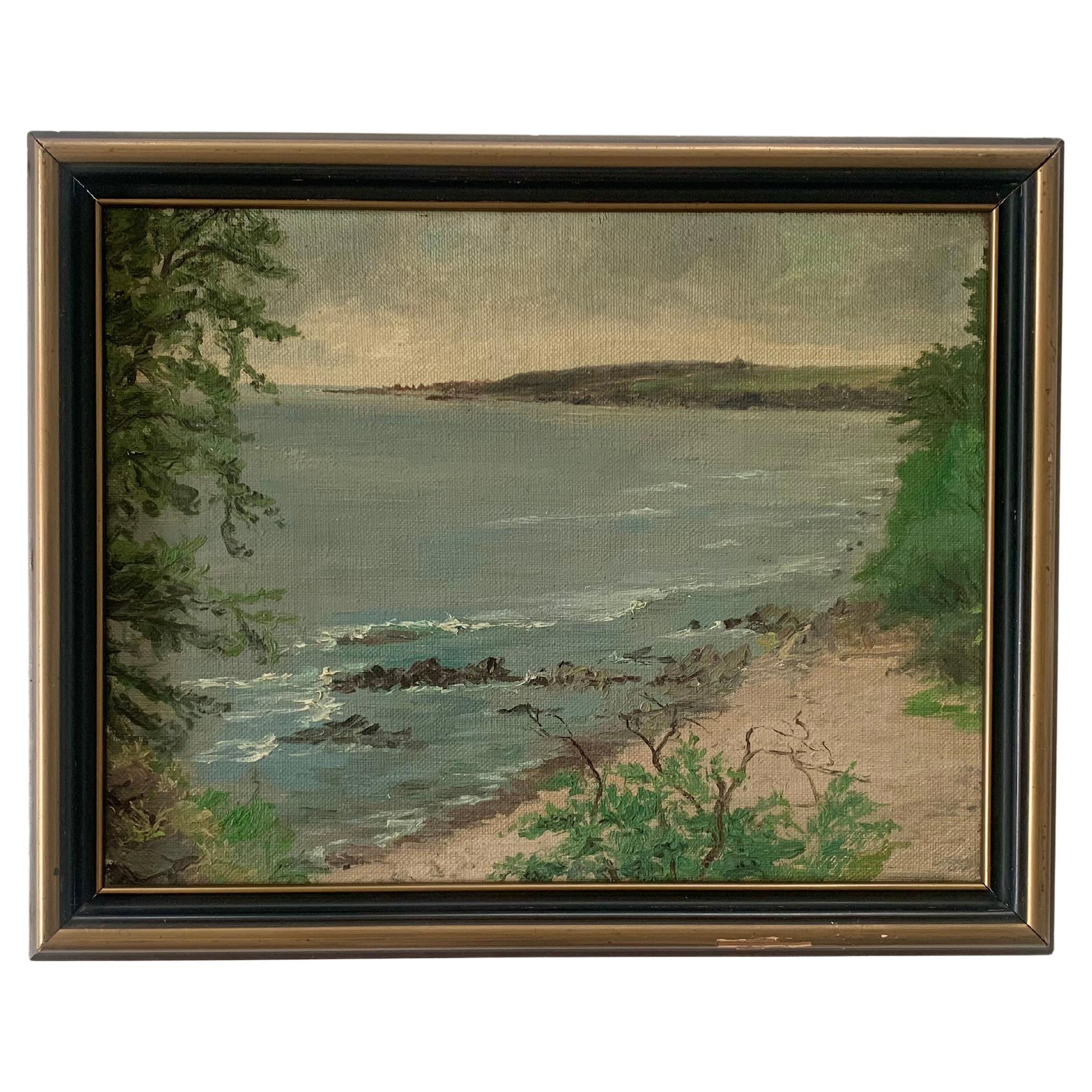 Peinture à l'huile danoise vintage du milieu du siècle représentant un paysage côtier dans des couleurs froides.