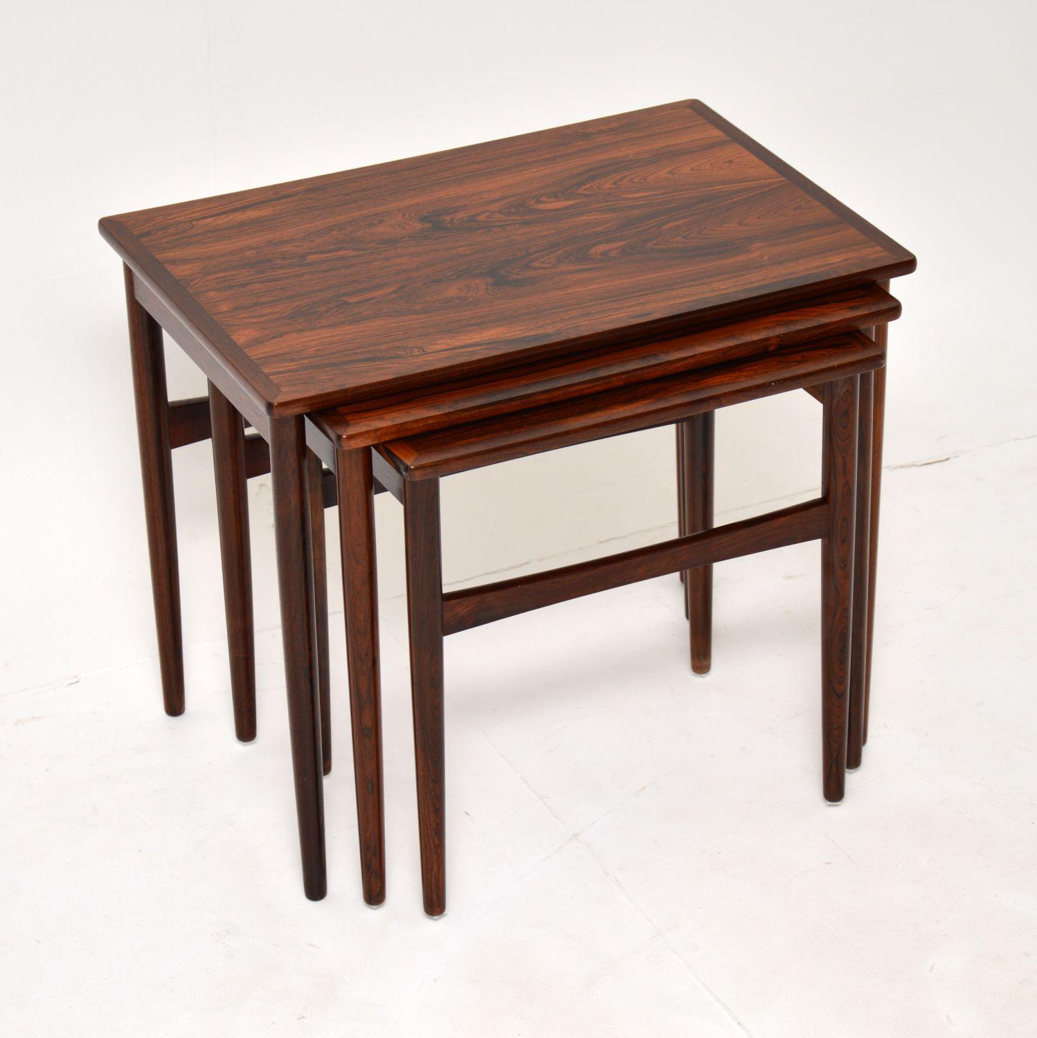 A superb vintage Danish nest of three tables. These were made by BR Glested in Denmark, they date from the 1960’s.

They have a gorgeous design and are of amazing quality. Elegant and compact, these are also solidly built. The wood grain patterns