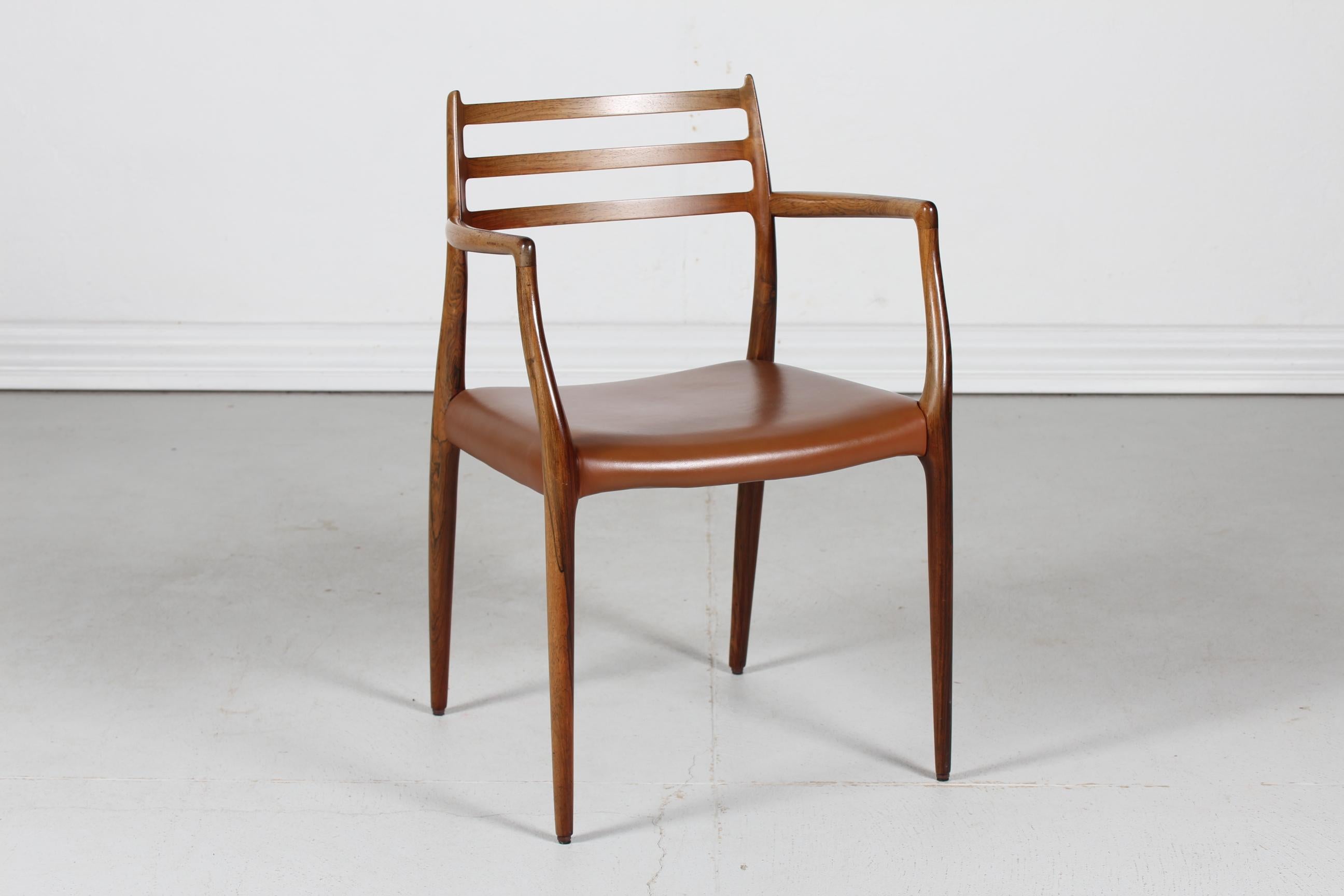 Here is an armchair model no 78 of rosewood with brown leather seat cover.
It's designed by N. O. Møller back in the 1960s.



        
